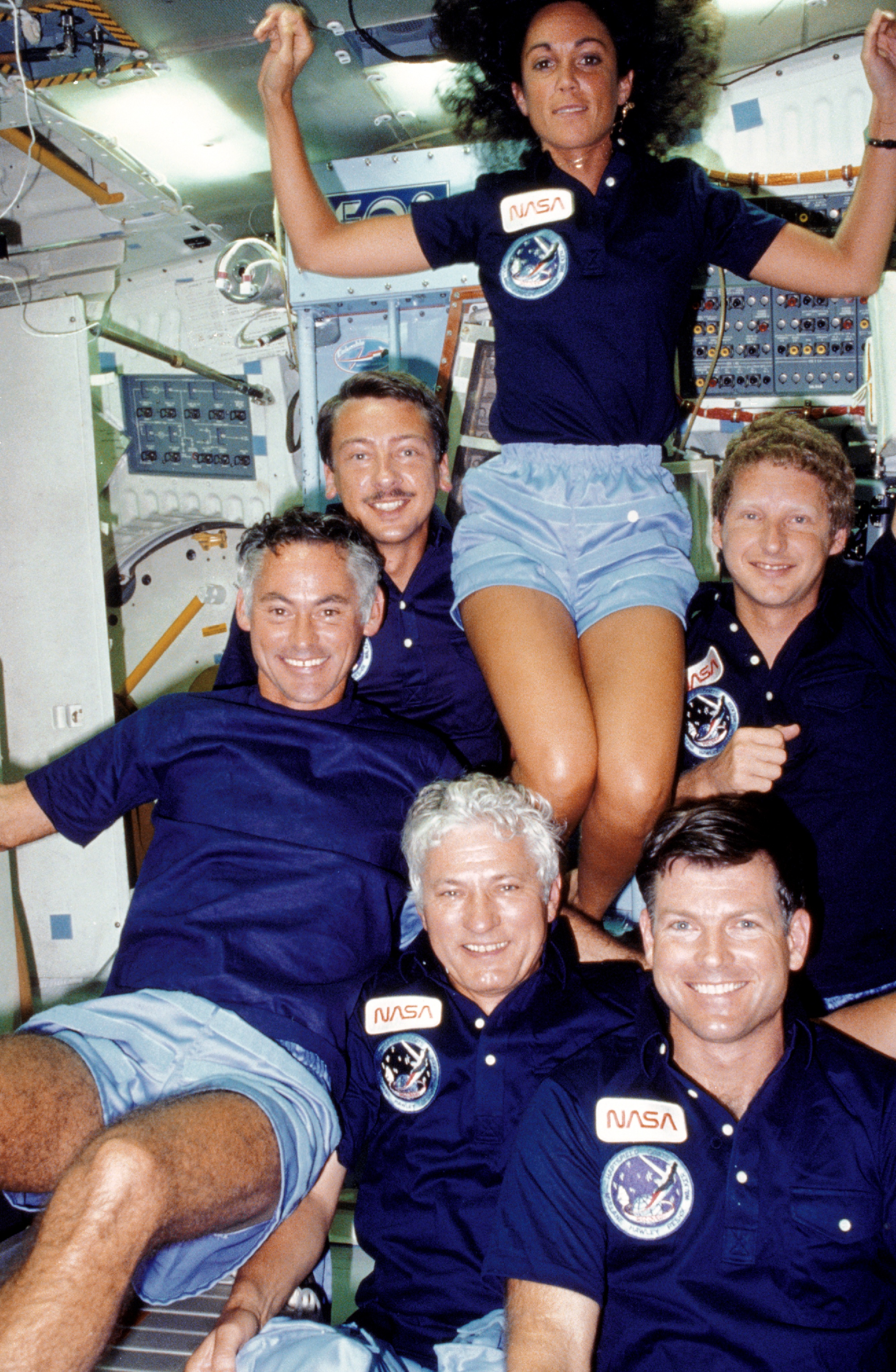 View of the STS 41-D crew in the middeck