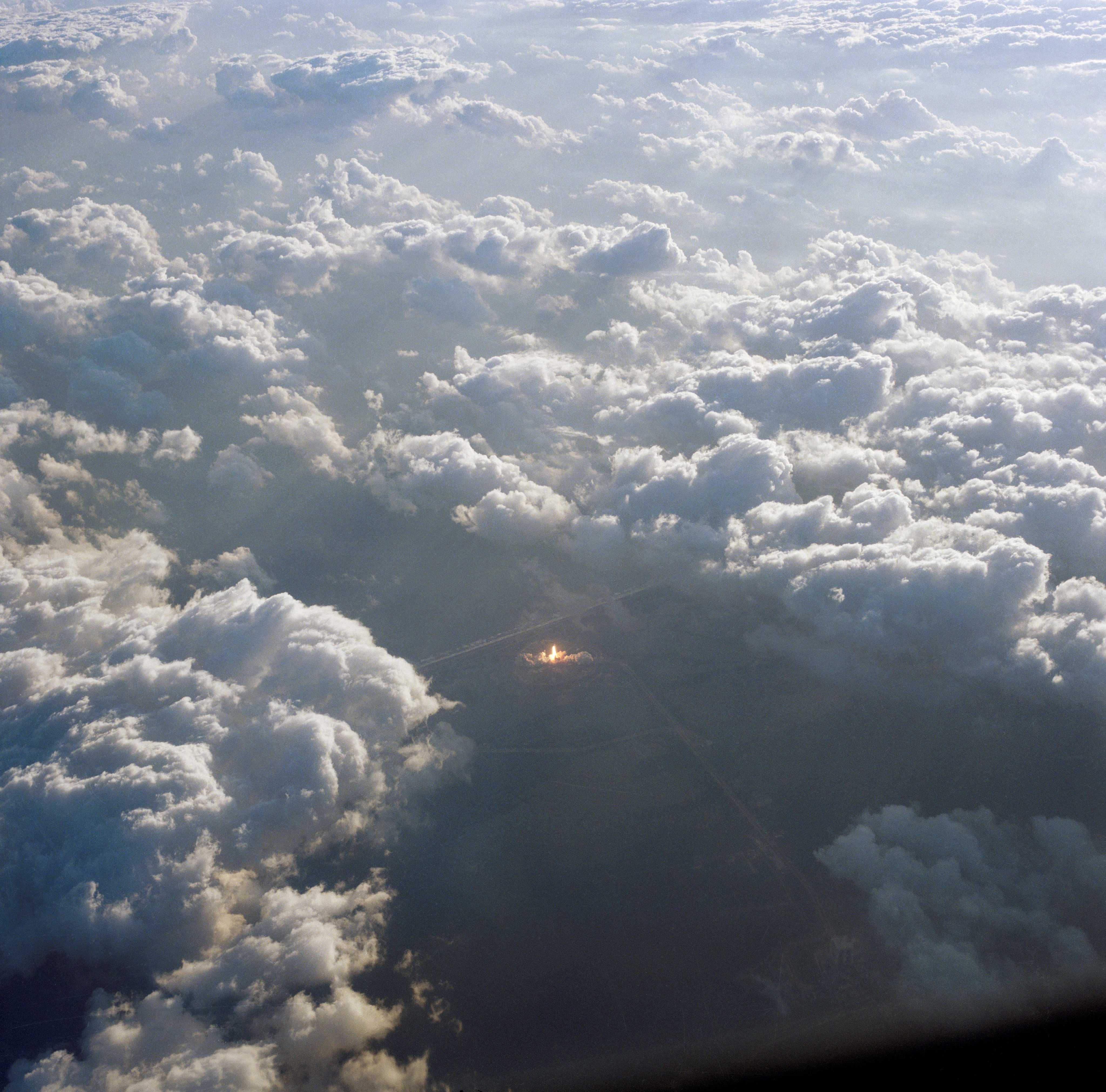 Aerial view of the launch of STS 51-A shuttle Discovery