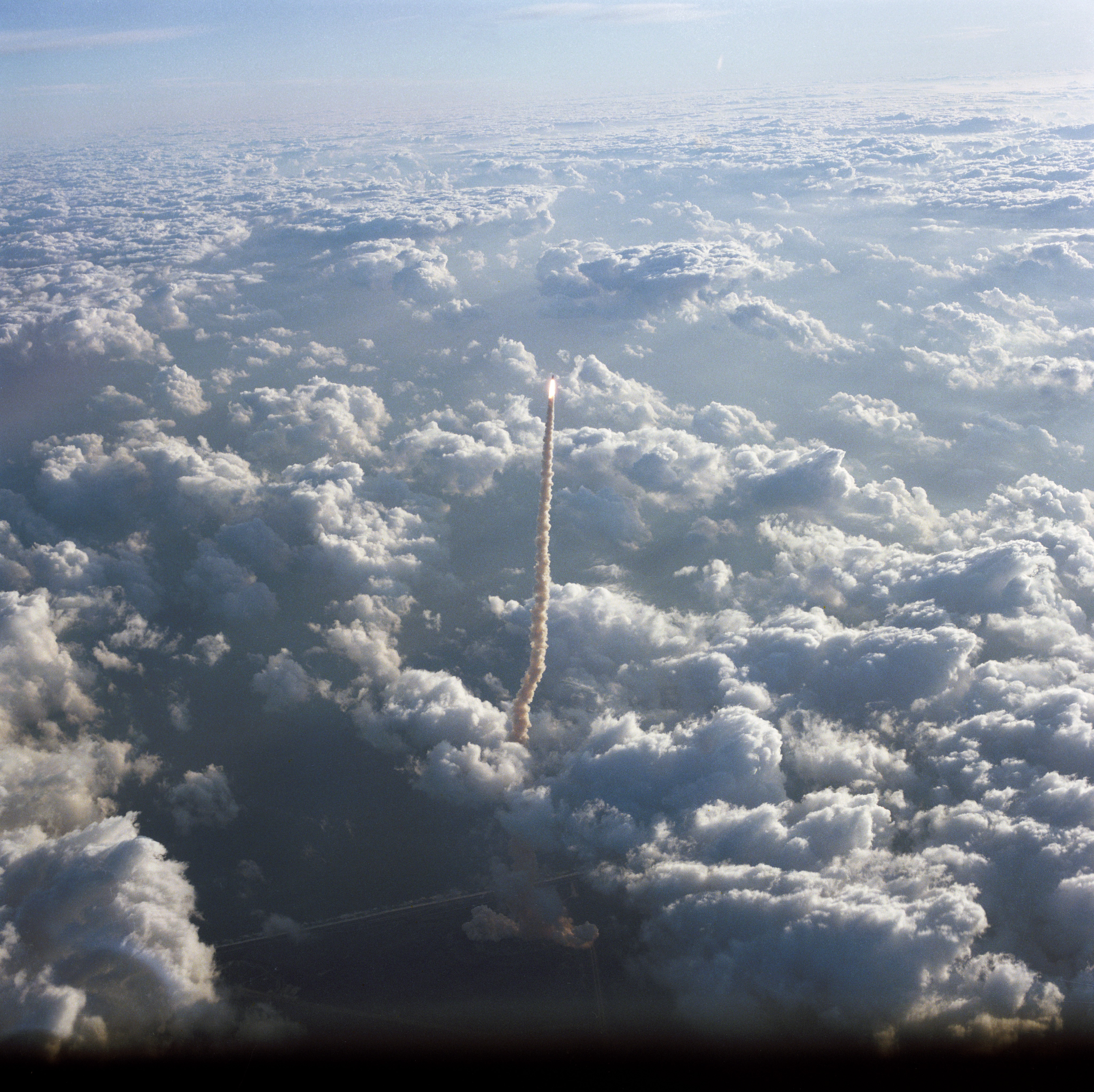 Aerial view of the launch of STS 51-A shuttle Discovery