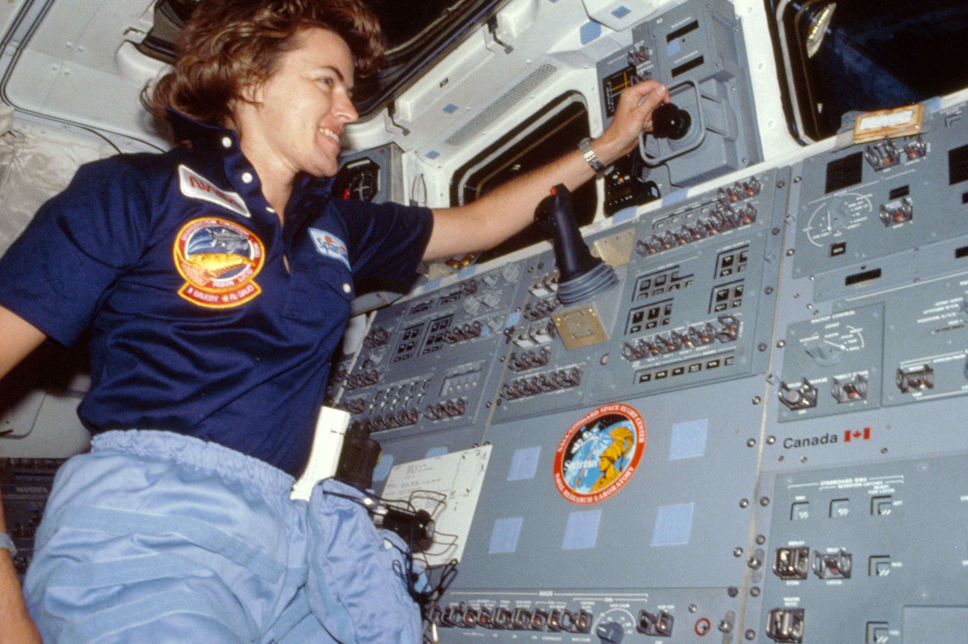Astronaut Shannon Lucid monitors payload bay activities