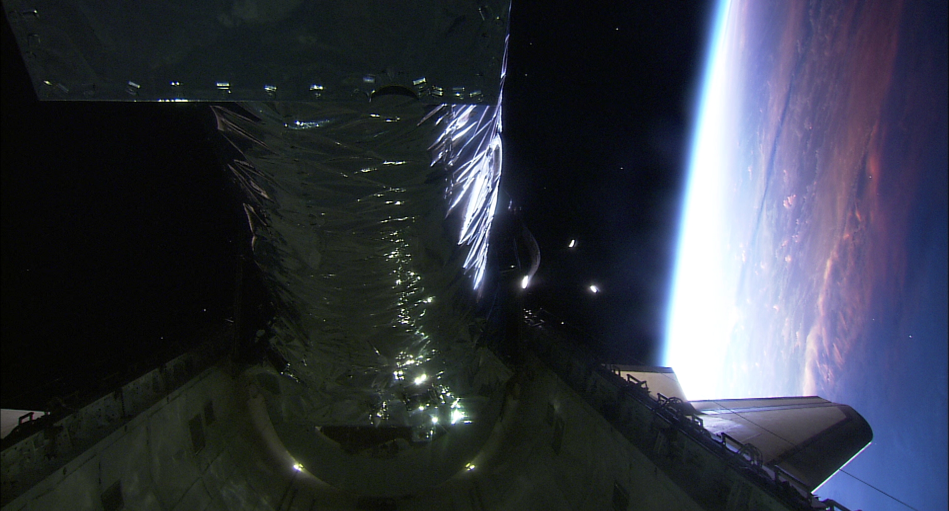 Views of the Chandra telescope take with HDTV on STS-93