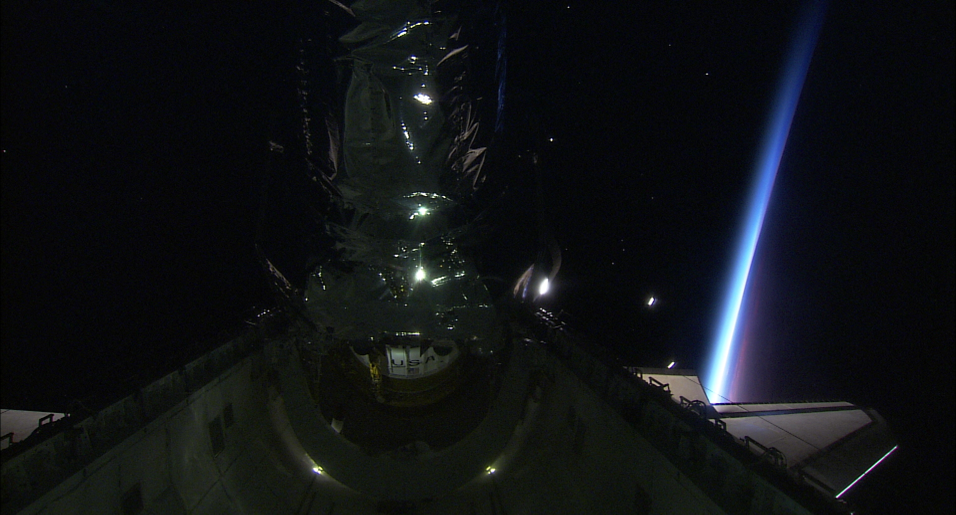 Views of the Chandra telescope take with HDTV on STS-93