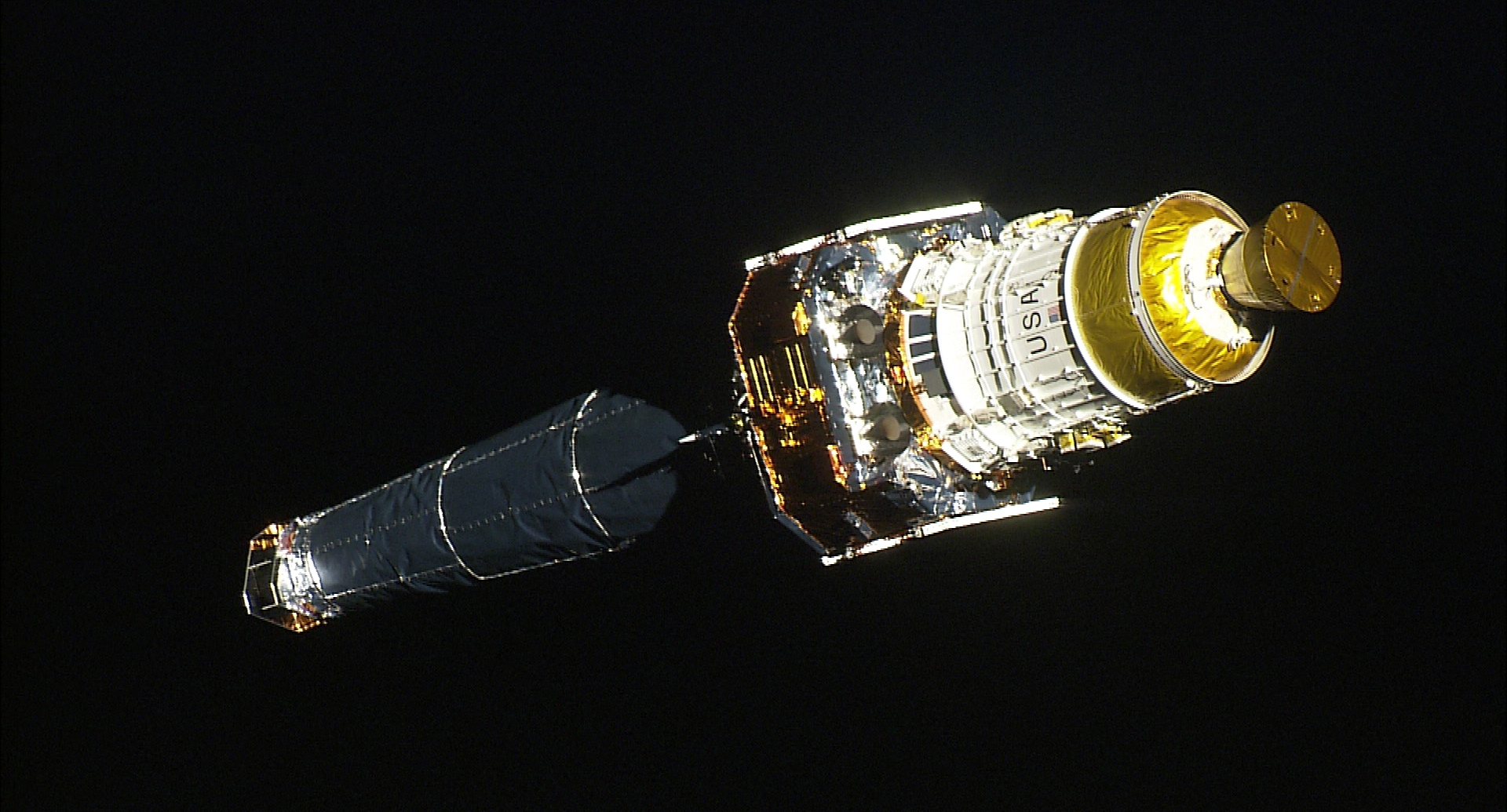 Views of the Chandra telescope take with HDTV on STS-93