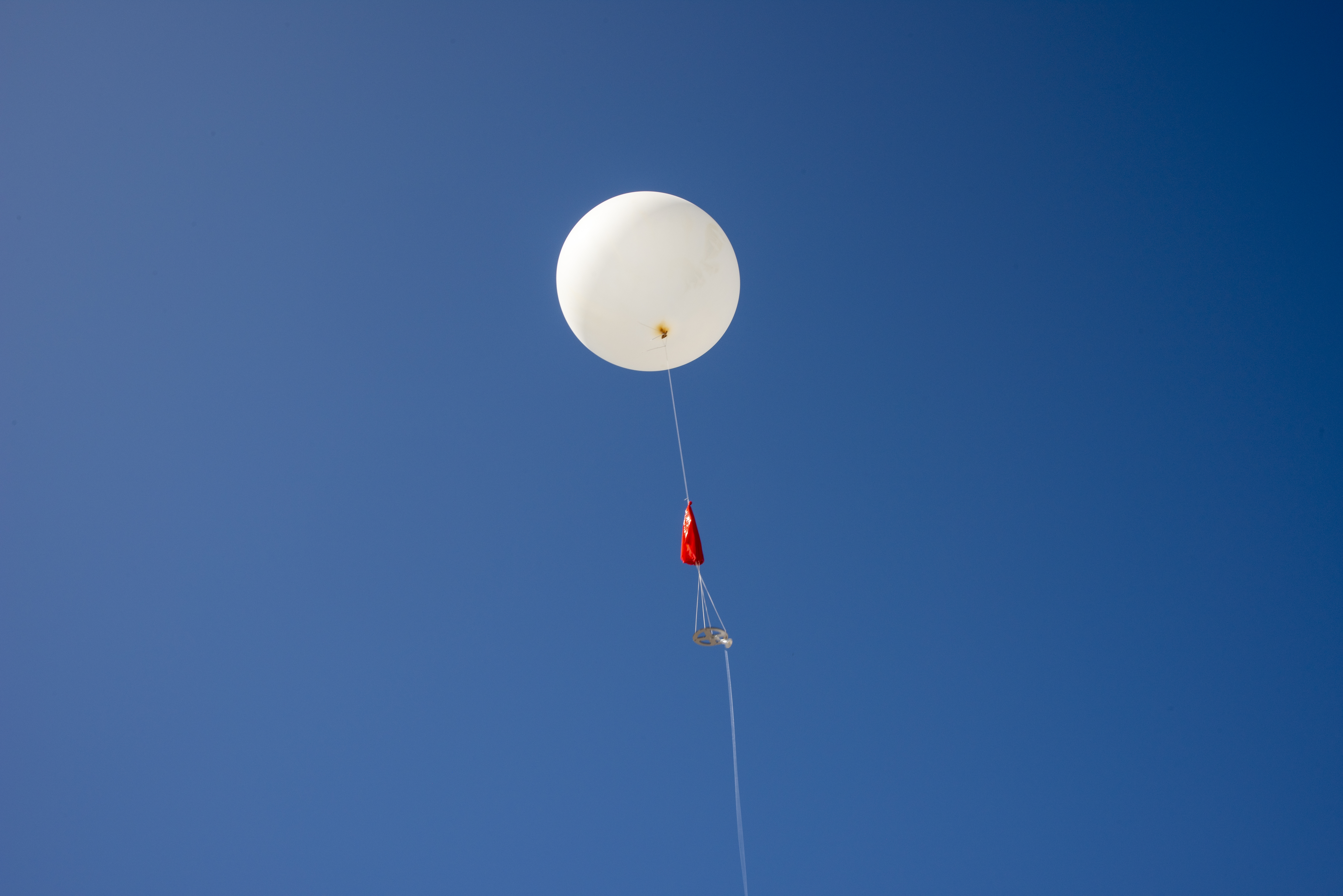 NASA Meteorologists Launch Weather Balloon Before Research Flight