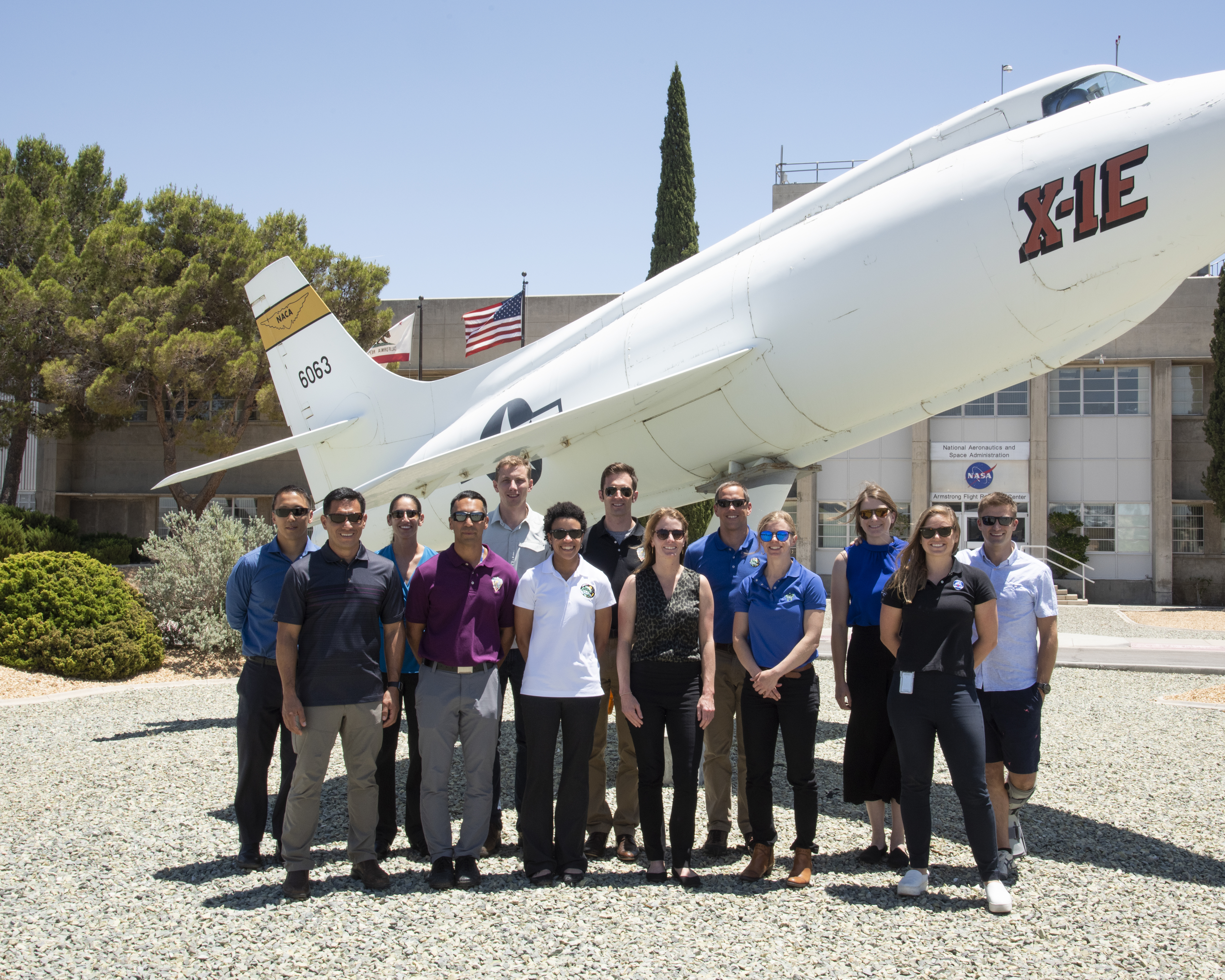 Astronauts Pose in Front of X-1E at Armstrong Flight Research Center