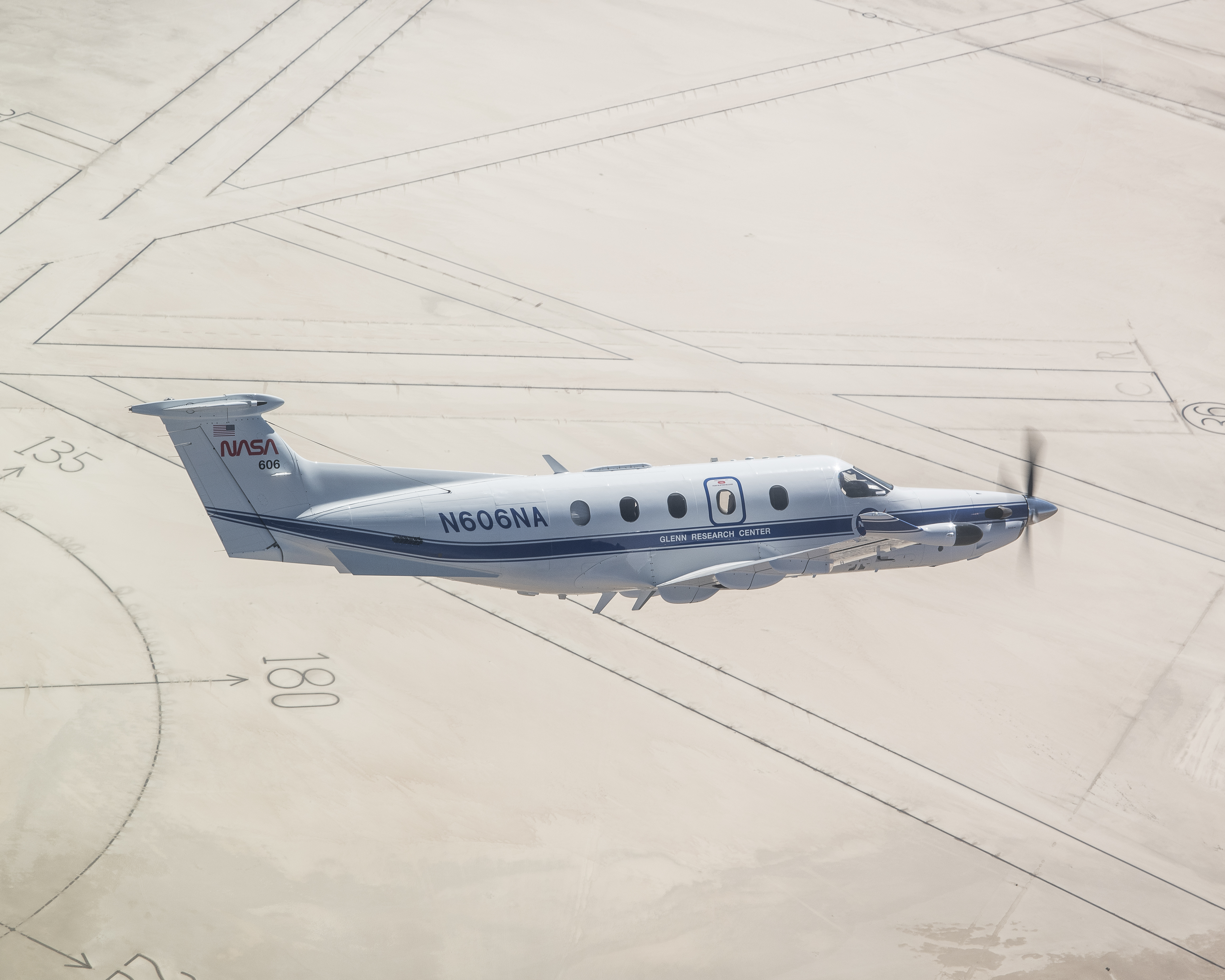 NASA’s Pilatus PC-12 flies over the world’s largest compass rose at NASA’s Armstrong Flight Research Center in Edwards, California on Sept. 18, 2024