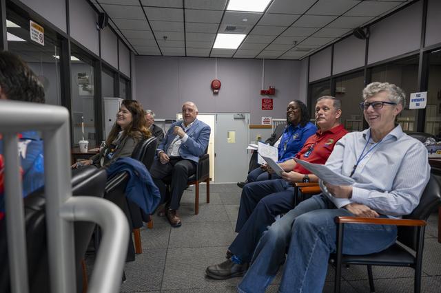 NASA Aeronautics and center leadership watch monitors inside the main control room at NASA Armstrong Flight Research Center during the X-59’s first flight.