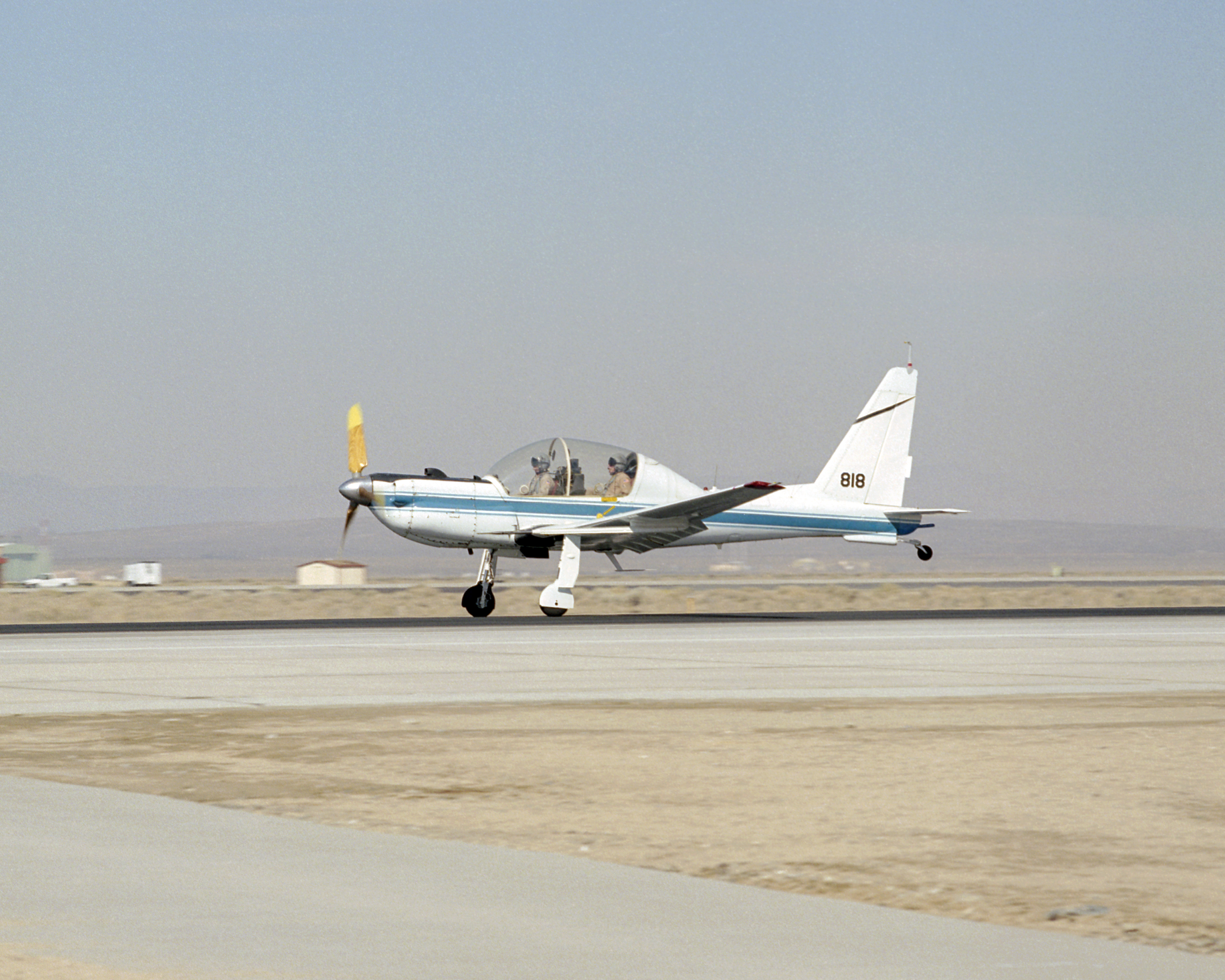 NASA's converted YO-3A observation plane, now used for acoustics research, touches down at Edwards Air Force Base following a pilot checkout flight