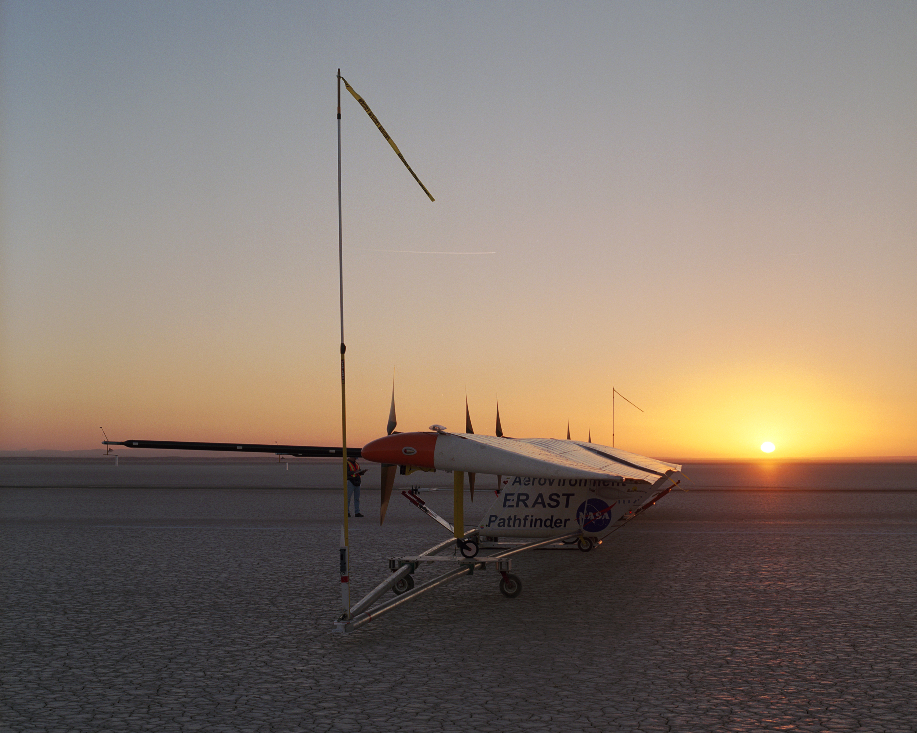 As the rising sun dawns over the parched bed of Rogers Dry Lake, AeroVironment's solar-electric Pathfinder-Plus awaits takeoff on its final research flight.