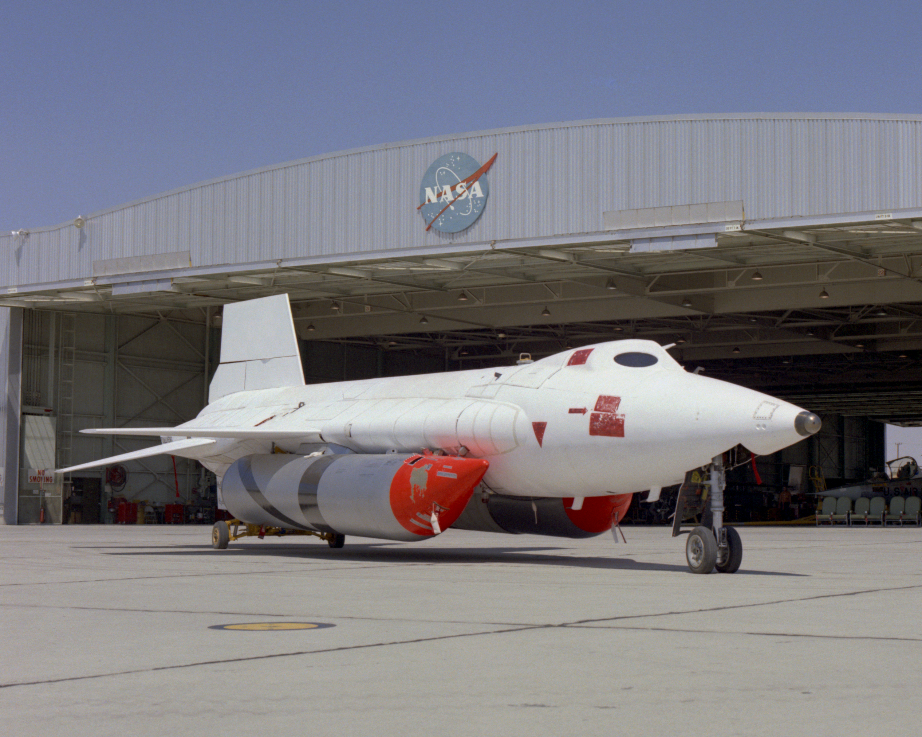 X-15A-2 with full scale ablative and external tanks installed parked in front of hangar
