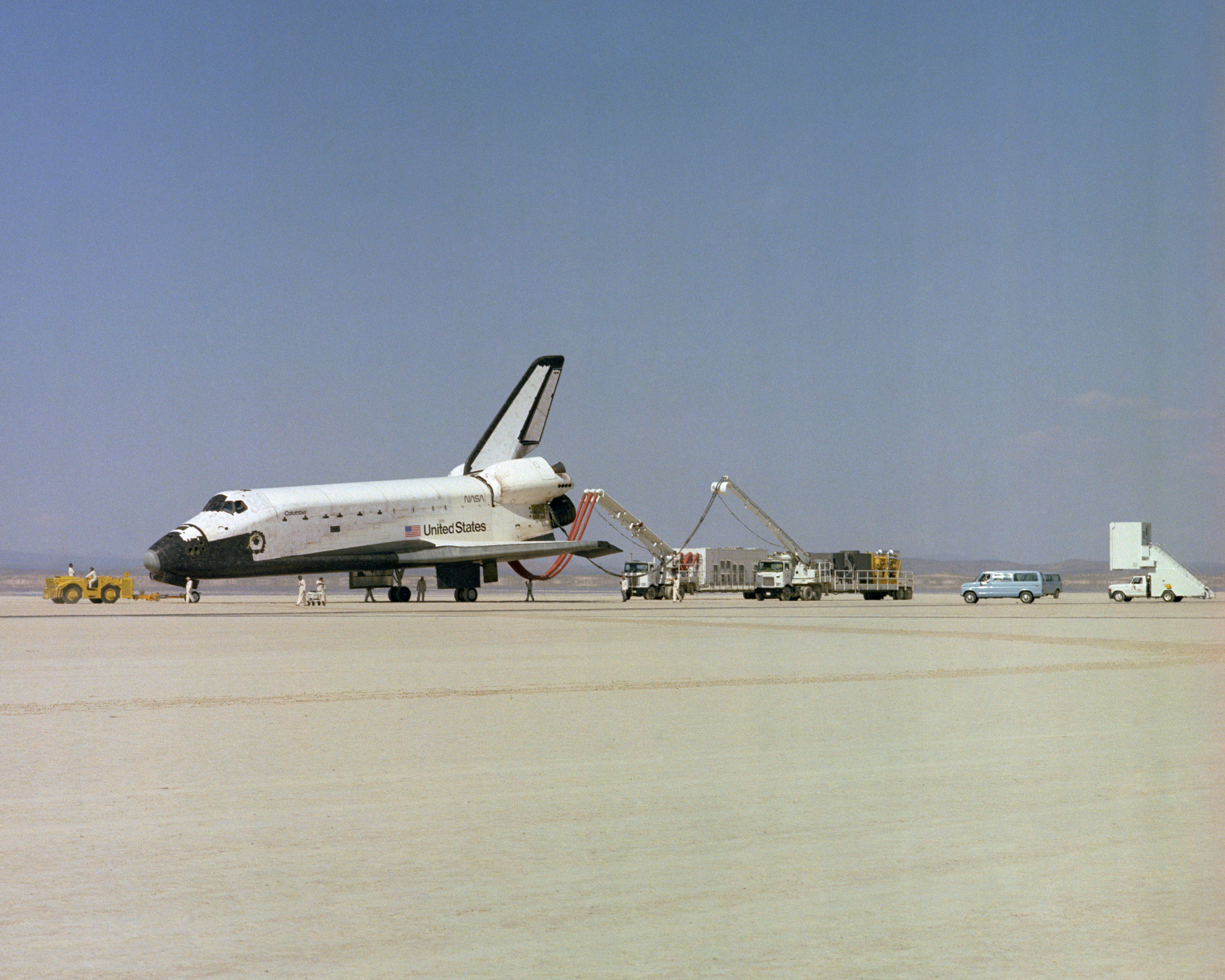 The Space Shuttle Columbia on Rogers Dry lakebed at Edwards AFB after landing to complete its first orbital mission on April 14, 1981