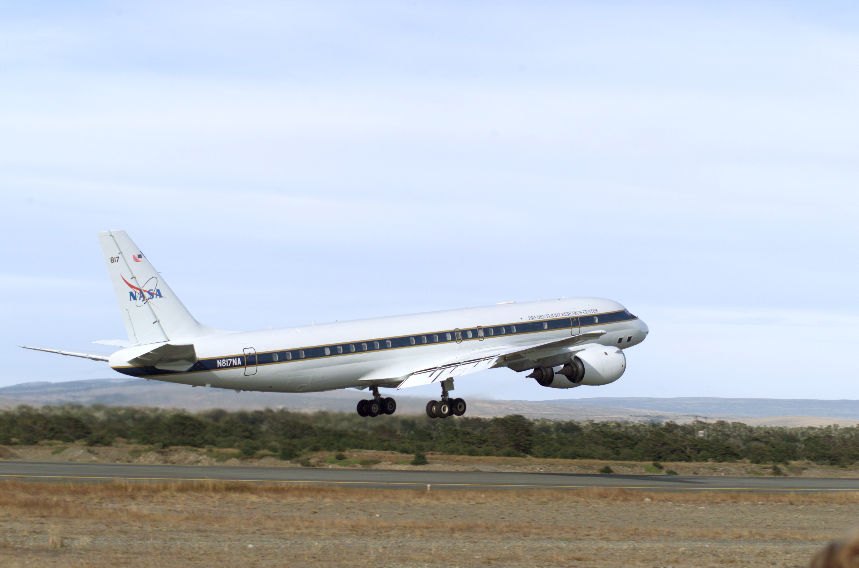 NASA's DC-8 flying laboratory takes off from Carlos Ibanez International Airport in Punta Arenas, Chile, during NASA's AirSAR 2004 campaign