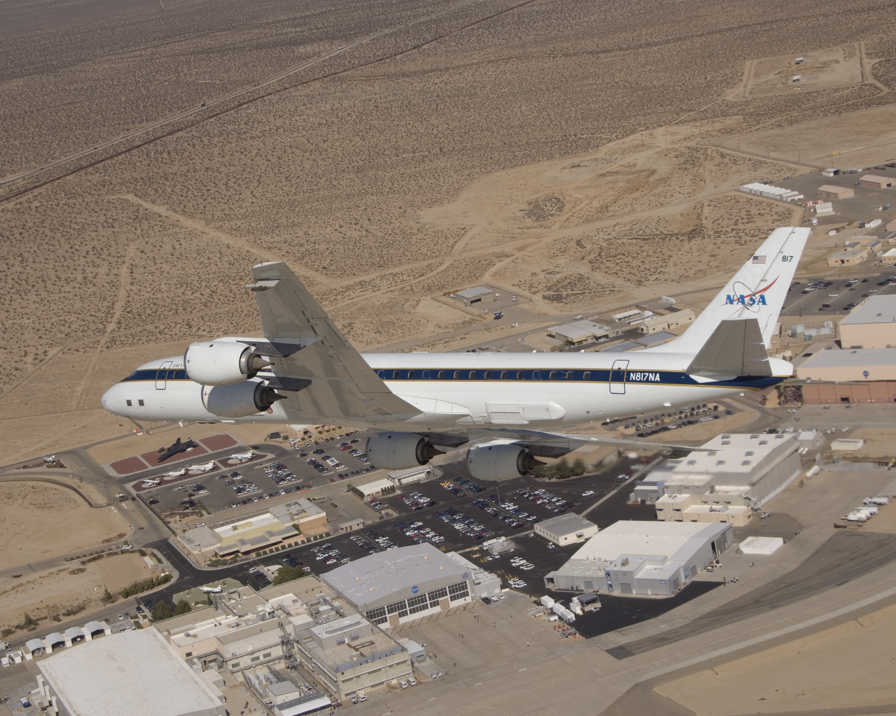 NASA's DC-8 airborne science laboratory soars over the Dryden Flight Research Center upon its return to the center on Nov. 8, 2007