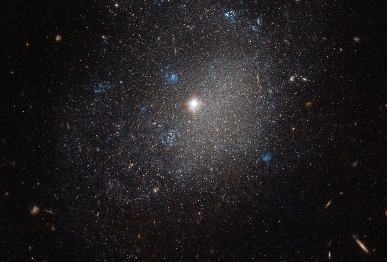Hubble Chases a Small Stellar Galaxy in the Hunting Dog