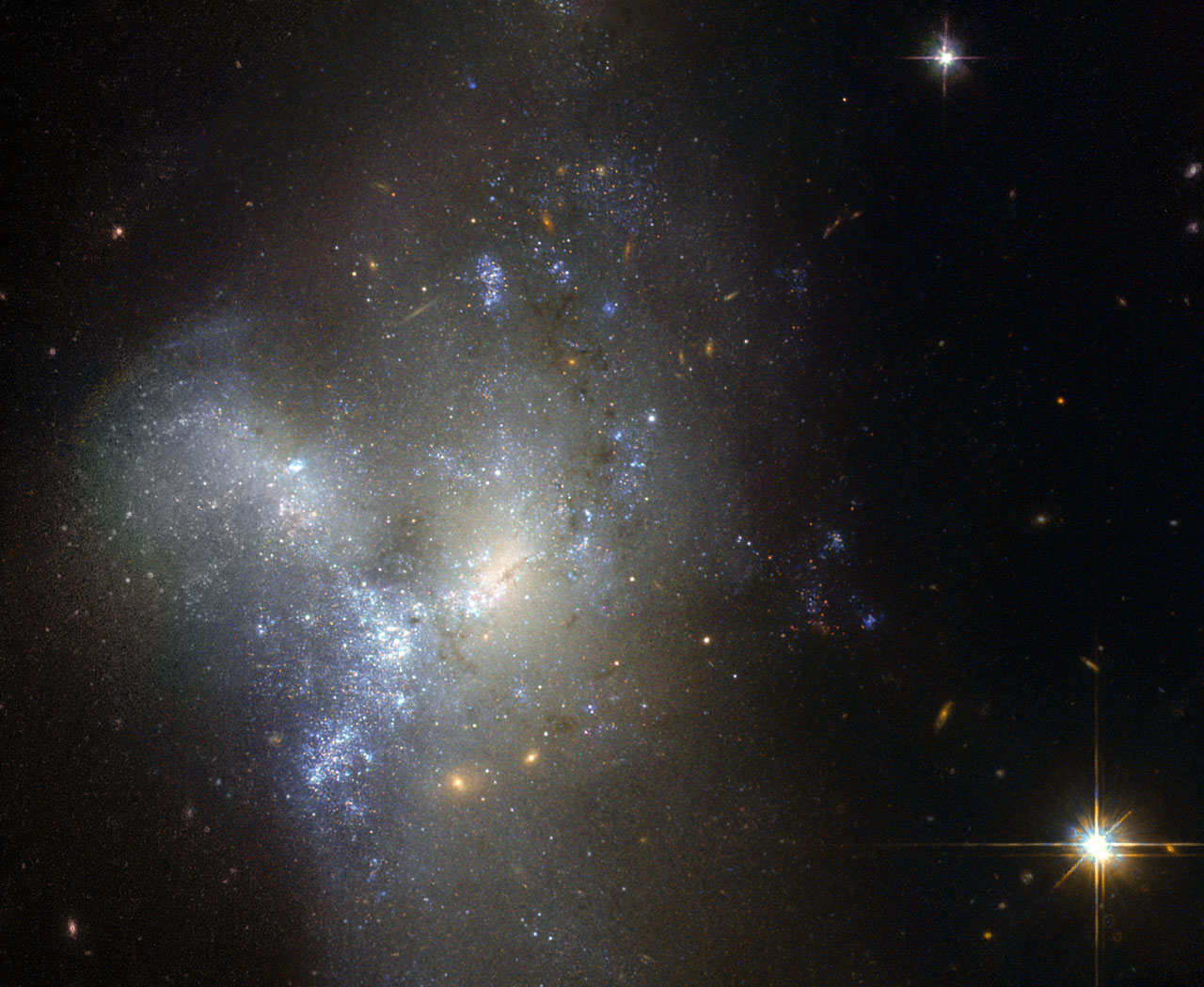 30 Million light-years Away Hubble Sees Merging Galaxies