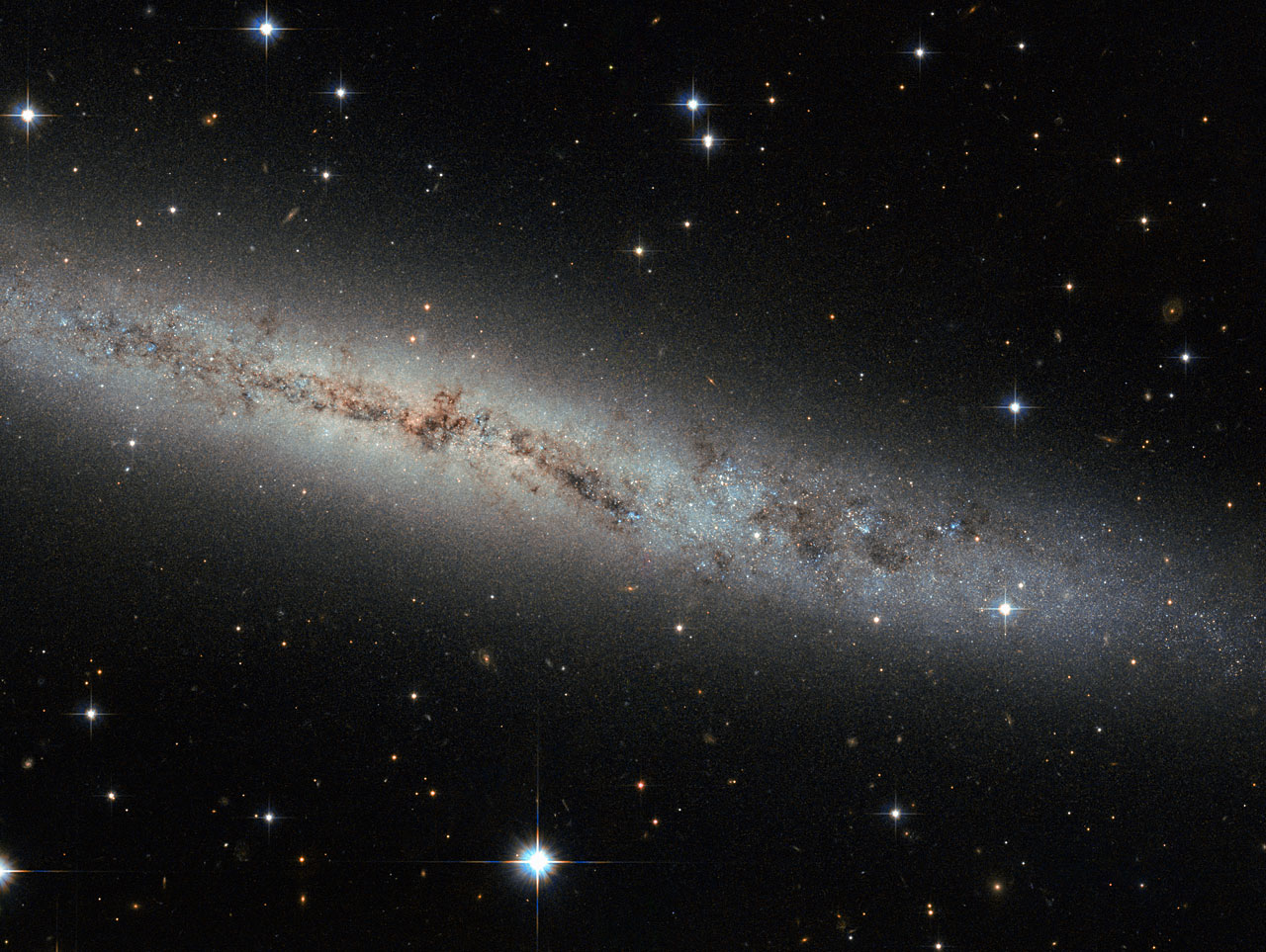 Hubble Eyes Galaxy as Flat as a Pancake