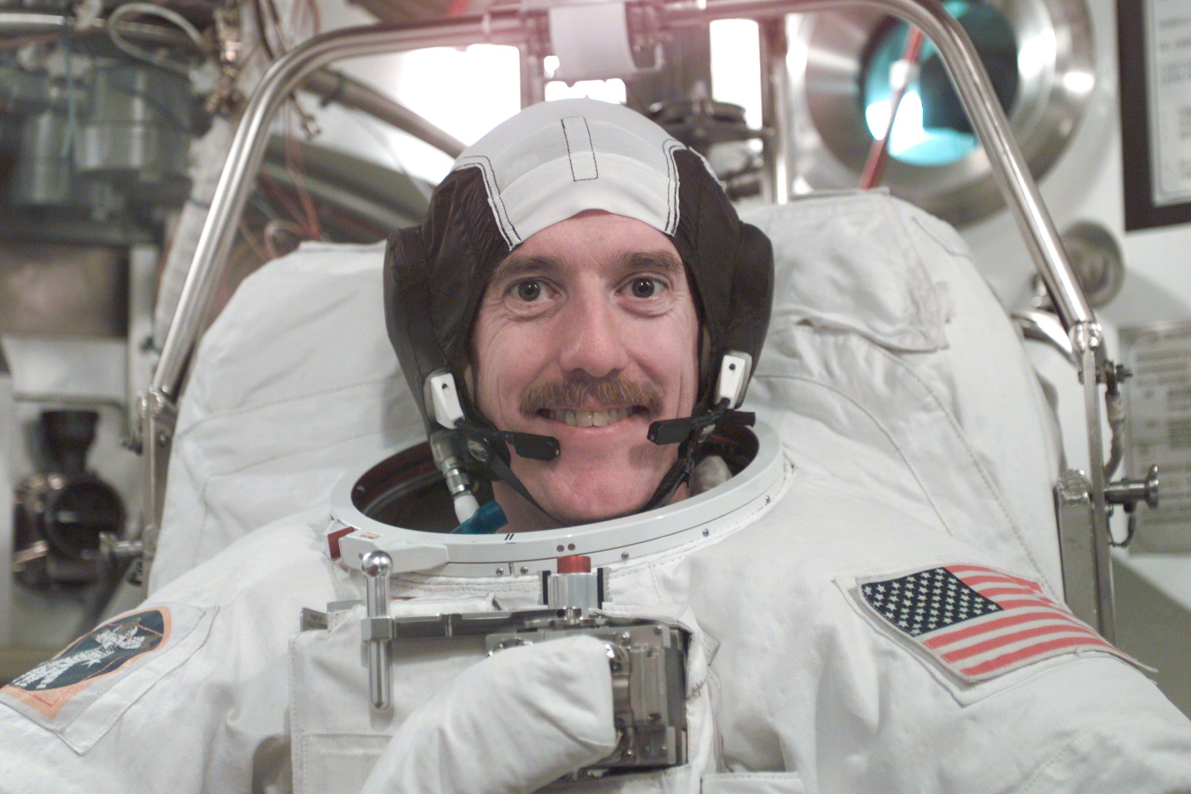 STS-104 Crew Training of Jim Reilly in EMU fit check