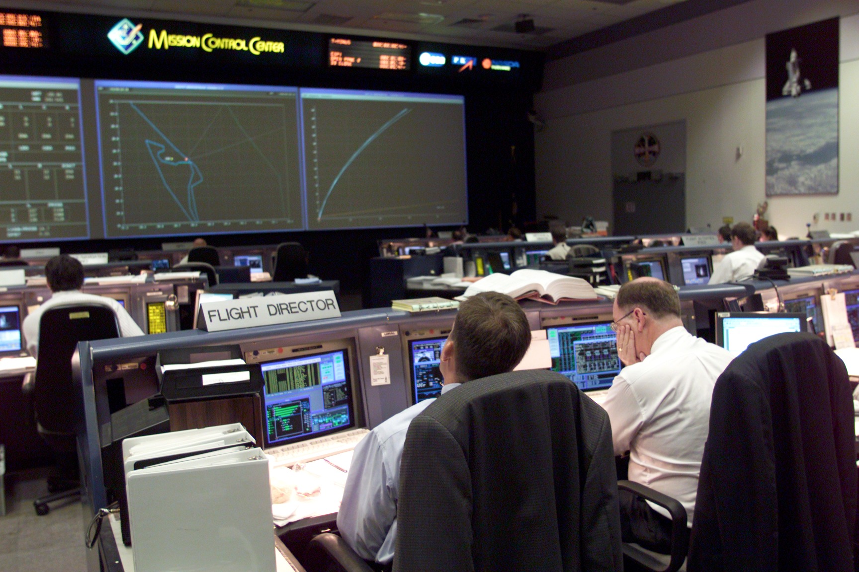 Coverage of STS-104 Launch Coverage of Flight Controllers in MCC.