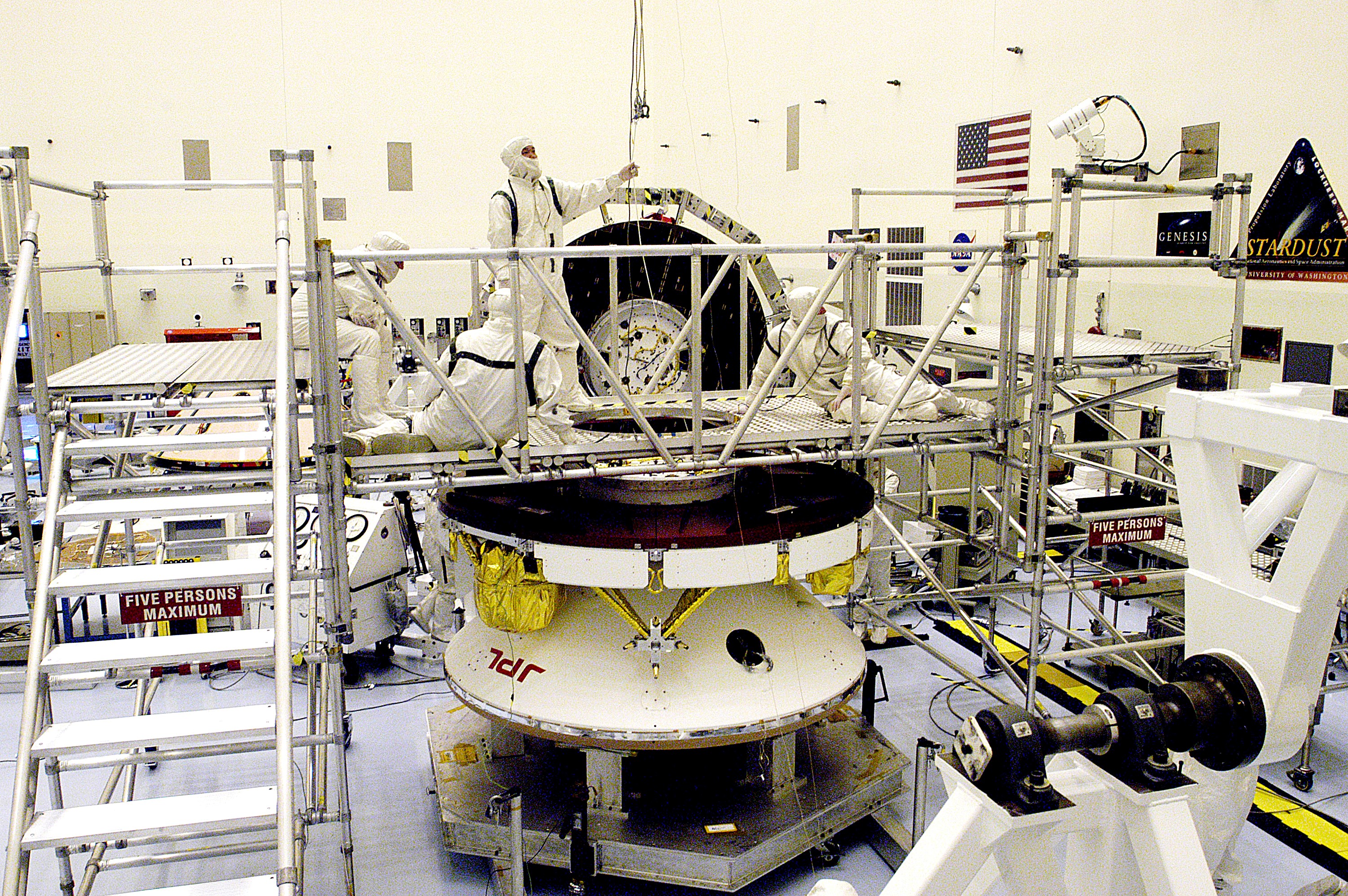KENNEDY SPACE CENTER, FLA. - Workers in the Payload Hazardous Servicing Facility prepare the Mars Exploration Rover 2 (MER-2) for a weight and center of gravity determination. NASA's twin Mars Exploration Rovers are designed to study the history of water on Mars. These robotic geologists are equipped with a robotic arm, a drilling tool, three spectrometers, and four pairs of cameras that allow them to have a human-like, 3D view of the terrain. Each rover could travel as far as 100 meters in one day to act as Mars scientists' eyes and hands, exploring an environment where humans can't yet go. Launch of MER-2 is scheduled for June 5 from Cape Canaveral Air Force Station.