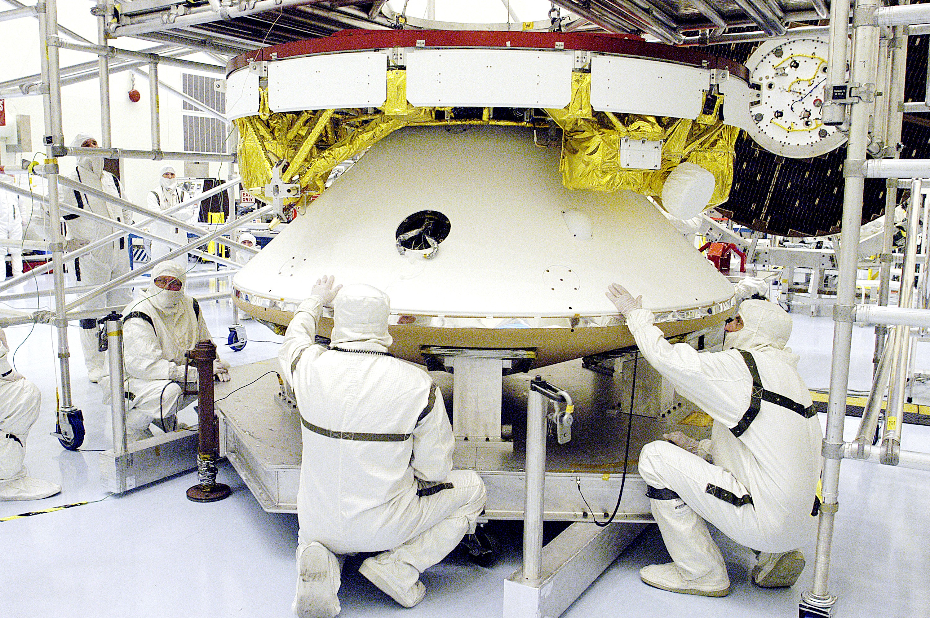 KENNEDY SPACE CENTER, FLA. - The Mars Exploration Rover 2 (MER-2) undergoes a weight and center of gravity determination in the Payload Hazardous Servicing Facility. NASA's twin Mars Exploration Rovers are designed to study the history of water on Mars. These robotic geologists are equipped with a robotic arm, a drilling tool, three spectrometers, and four pairs of cameras that allow them to have a human-like, 3D view of the terrain. Each rover could travel as far as 100 meters in one day to act as Mars scientists' eyes and hands, exploring an environment where humans can't yet go. Launch of MER-2 is scheduled for June 5 from Cape Canaveral Air Force Station.