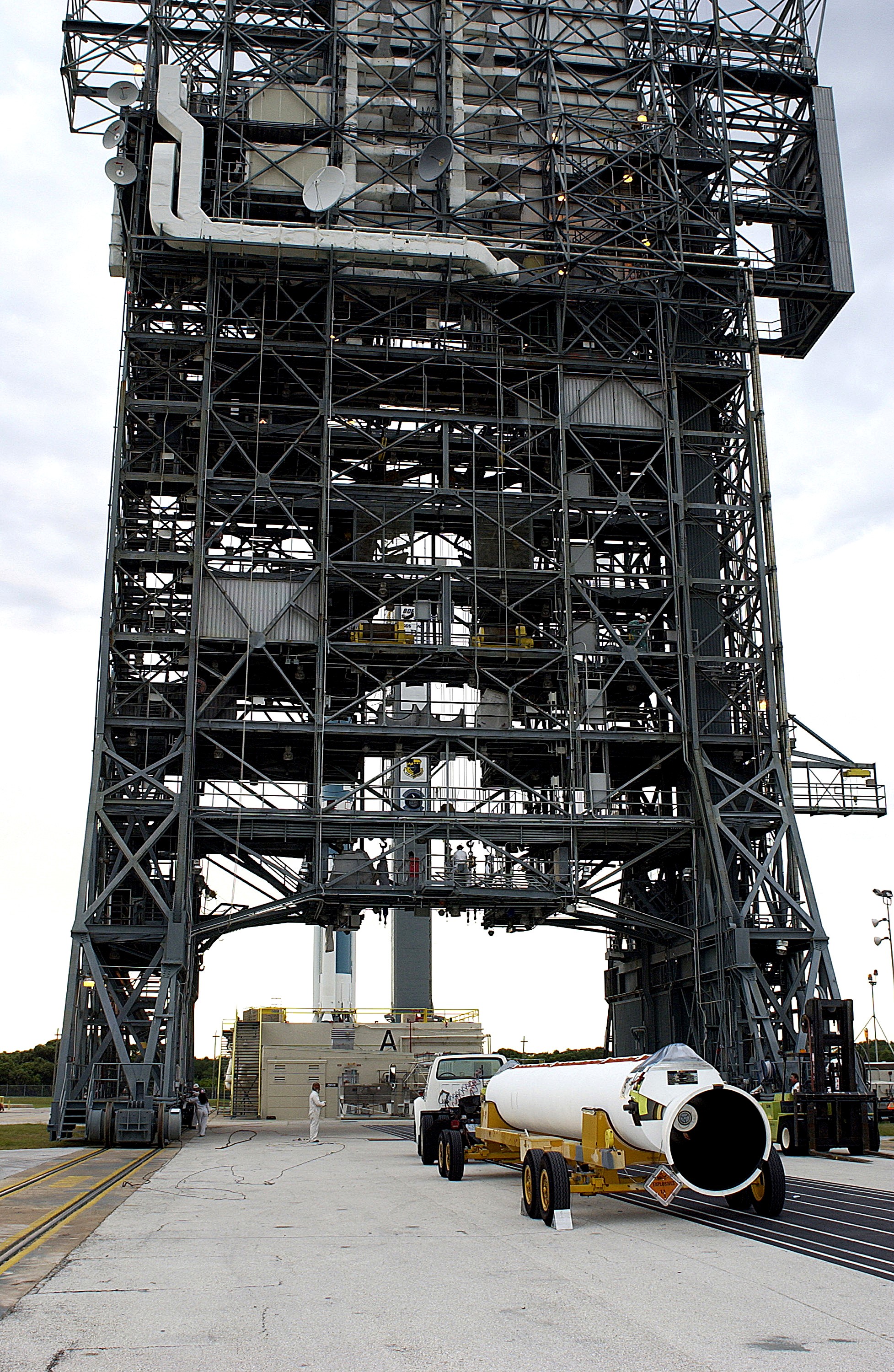 KENNEDY SPACE CENTER, FLA. - A solid rocket booster arrives at Launch Complex 17-A, Cape Canaveral Air Force Station. It is one of nine that will be mated to the Delta rocket to launch Mars Exploration Rover 2. NASA’s twin Mars Exploration Rovers are designed to study the history of water on Mars. These robotic geologists are equipped with a robotic arm, a drilling tool, three spectrometers, and four pairs of cameras that allow them to have a human-like, 3D view of the terrain. Each rover could travel as far as 100 meters in one day to act as Mars scientists' eyes and hands, exploring an environment where humans can’t yet go. MER-2 is scheduled to launch June 5 as MER-A. MER-1 (MER-B) will launch June 25.
