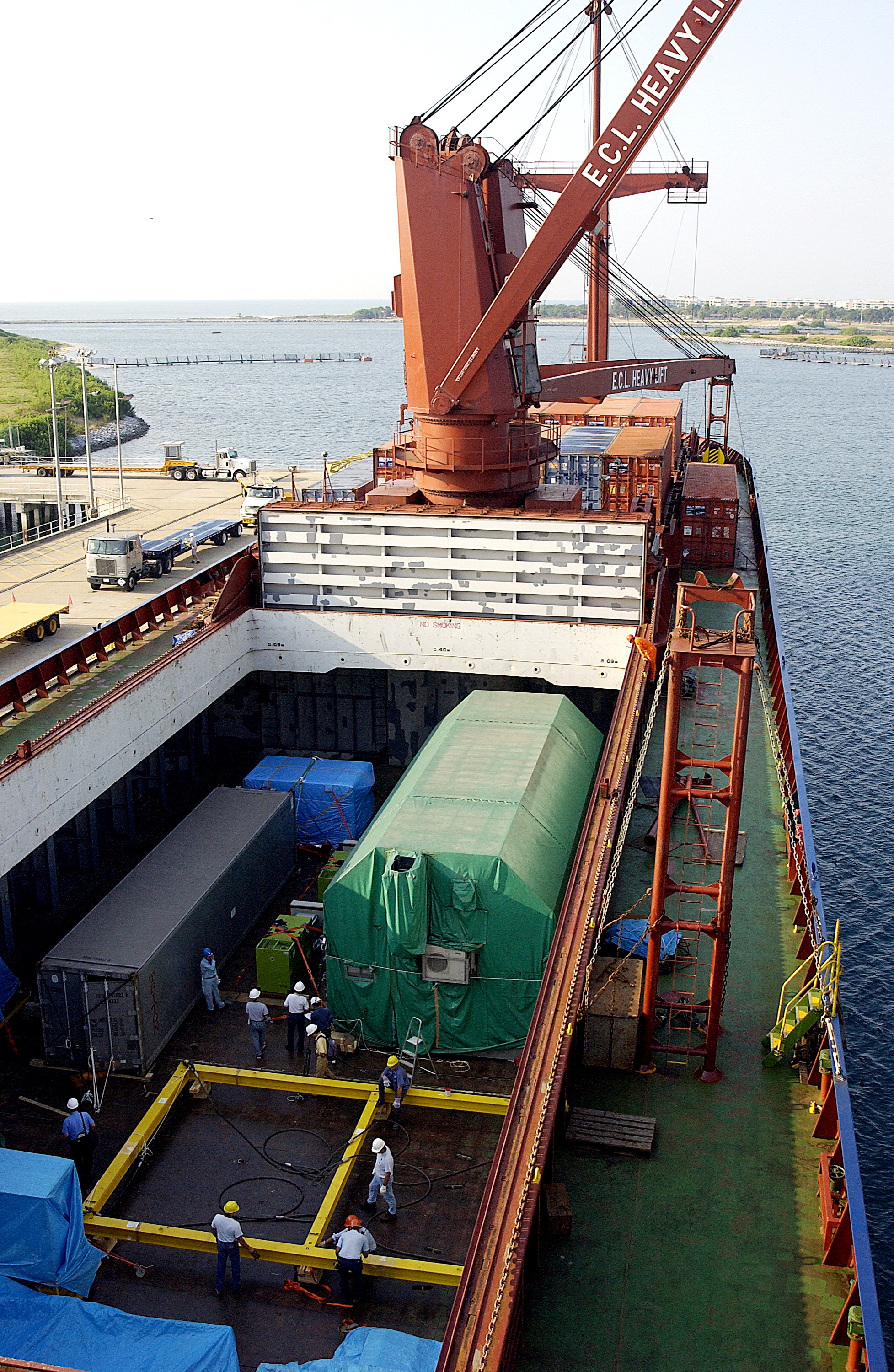 KENNEDY SPACE CENTER, FLA. - The Japanese Experiment Module (JEM) Pressurized Module is ready to be offloaded from the ship that carried it from Japan. The National Space Development Agency of Japan (NASDA) built the laboratory at the Tsukuba Space Center near Tokyo. The Pressurized Module is the first element of the JEM, Japan’s primary contribution to the space station, to be delivered to KSC. It will enhance the unique research capabilities of the orbiting complex by providing an additional shirt-sleeve environment for astronauts to conduct science experiments. The JEM also includes two logistics modules, an exposed pallet for space environment experiments and a robotic manipulator system that are still under construction in Japan. The various JEM components will be assembled in space over the course of three space shuttle missions.
