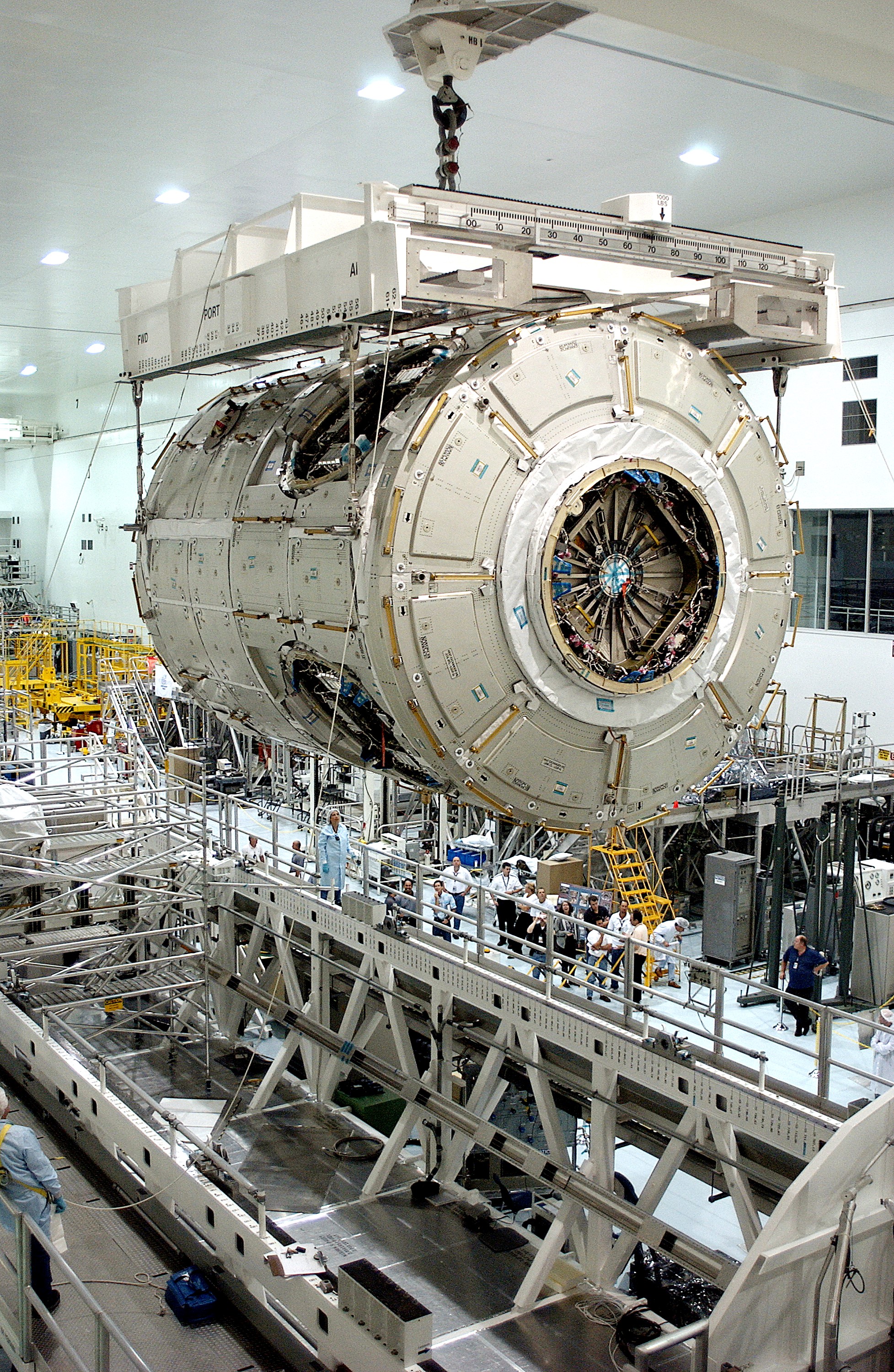KENNEDY SPACE CENTER, FLA. - The U.S. Node 2 moves toward a workstand in the Space Station Processing Facility. The second of three connecting modules on the International Space Station, the Italian-built Node 2 attaches to the end of the U.S. Lab and provides attach locations for the Japanese laboratory, European laboratory, the Centrifuge Accommodation Module and, later, Multipurpose Logistics Modules. It will provide the primary docking location for the Shuttle when a pressurized mating adapter is attached to Node 2. Installation of the module will complete the U.S. Core of the ISS. Node 2 is the designated payload for mission STS-120. No orbiter or launch date has been determined yet.