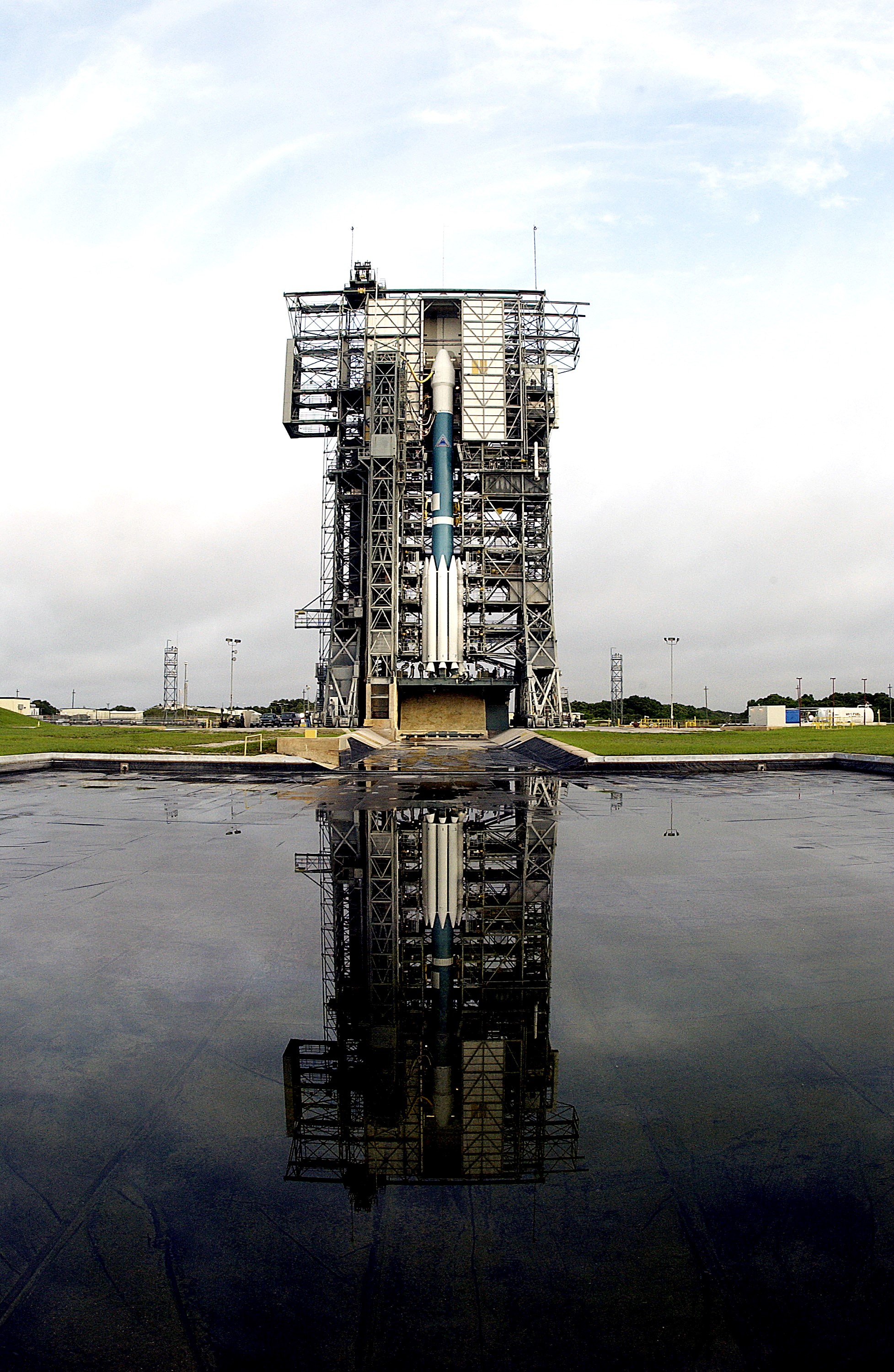 KENNEDY SPACE CENTER, FLA. - On Launch Complex 17-A, Cape Canaveral Air Force Station, the Boeing Delta II rocket and Mars Exploration Rover 2 (MER-A) are ready for the third launch attempt after weather concerns postponed earlier attempts. MER-A is the first of two rovers being launched to Mars. When the two rovers arrive at Mars in 2004, they will bounce to airbag-cushioned landings at sites offering a balance of favorable conditions for safe landings and interesting science. The rovers see sharper images, can explore farther and examine rocks better than anything that has ever landed on Mars. The designated site for MER-A mission is Gusev Crater, which appears to have been a crater lake. The second rover, MER-B, is scheduled to launch June 25.