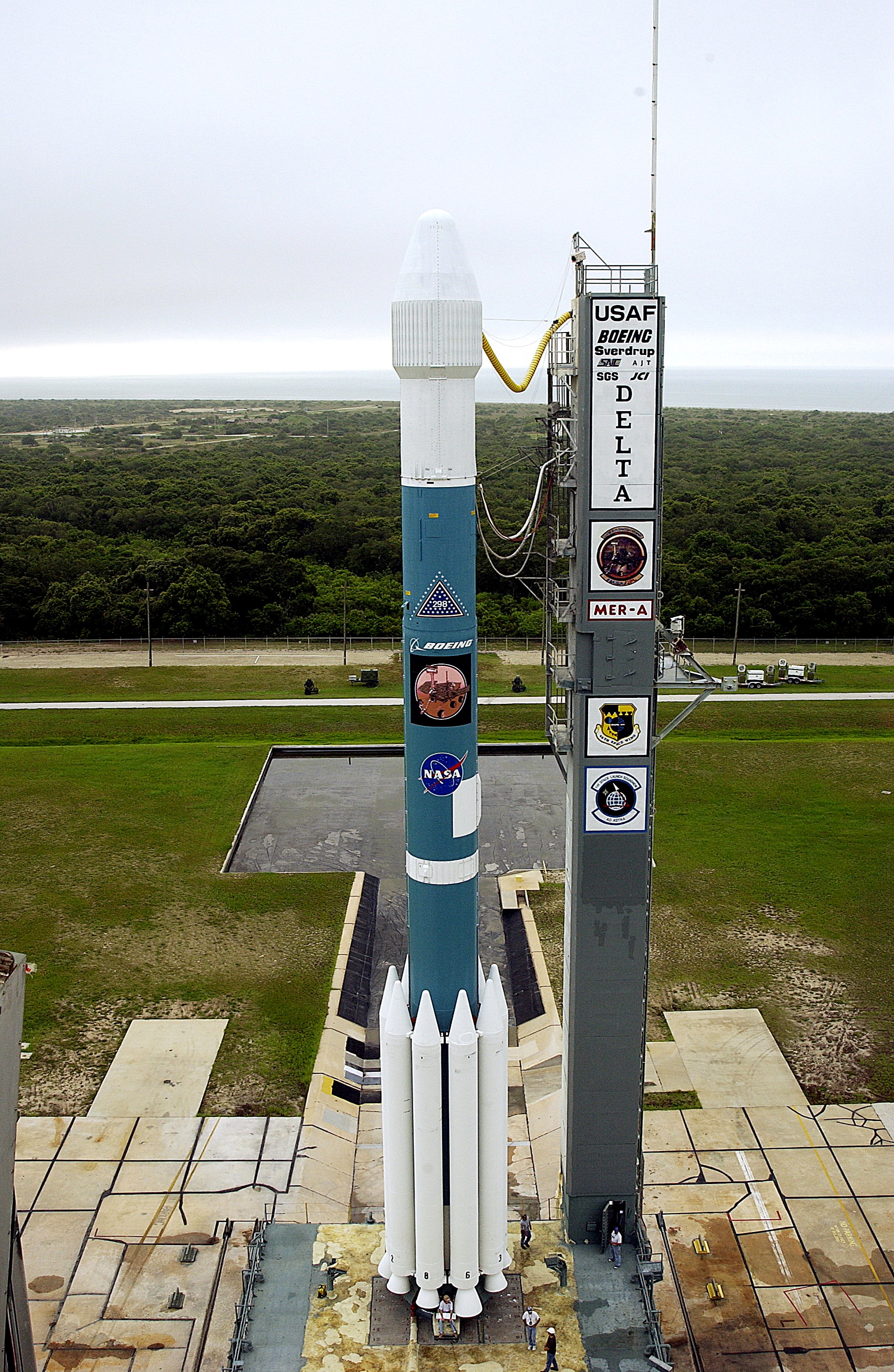 KENNEDY SPACE CENTER, FLA. - On Launch Complex 17-A, Cape Canaveral Air Force Station, the Boeing Delta II rocket and its Mars Exploration Rover (MER-A) payload are free of the tower and ready for launch. This will be the third launch attempt in as many days after weather concerns postponed the launches June 8 and June 9. MER-A is the first of two rovers being launched to Mars. When the two rovers arrive at Mars in 2004, they will bounce to airbag-cushioned landings at sites offering a balance of favorable conditions for safe landings and interesting science. The rovers see sharper images, can explore farther and examine rocks better than anything that has ever landed on Mars. The designated site for MER-A mission is Gusev Crater, which appears to have been a crater lake. The second rover, MER-B, is scheduled to launch June 25.