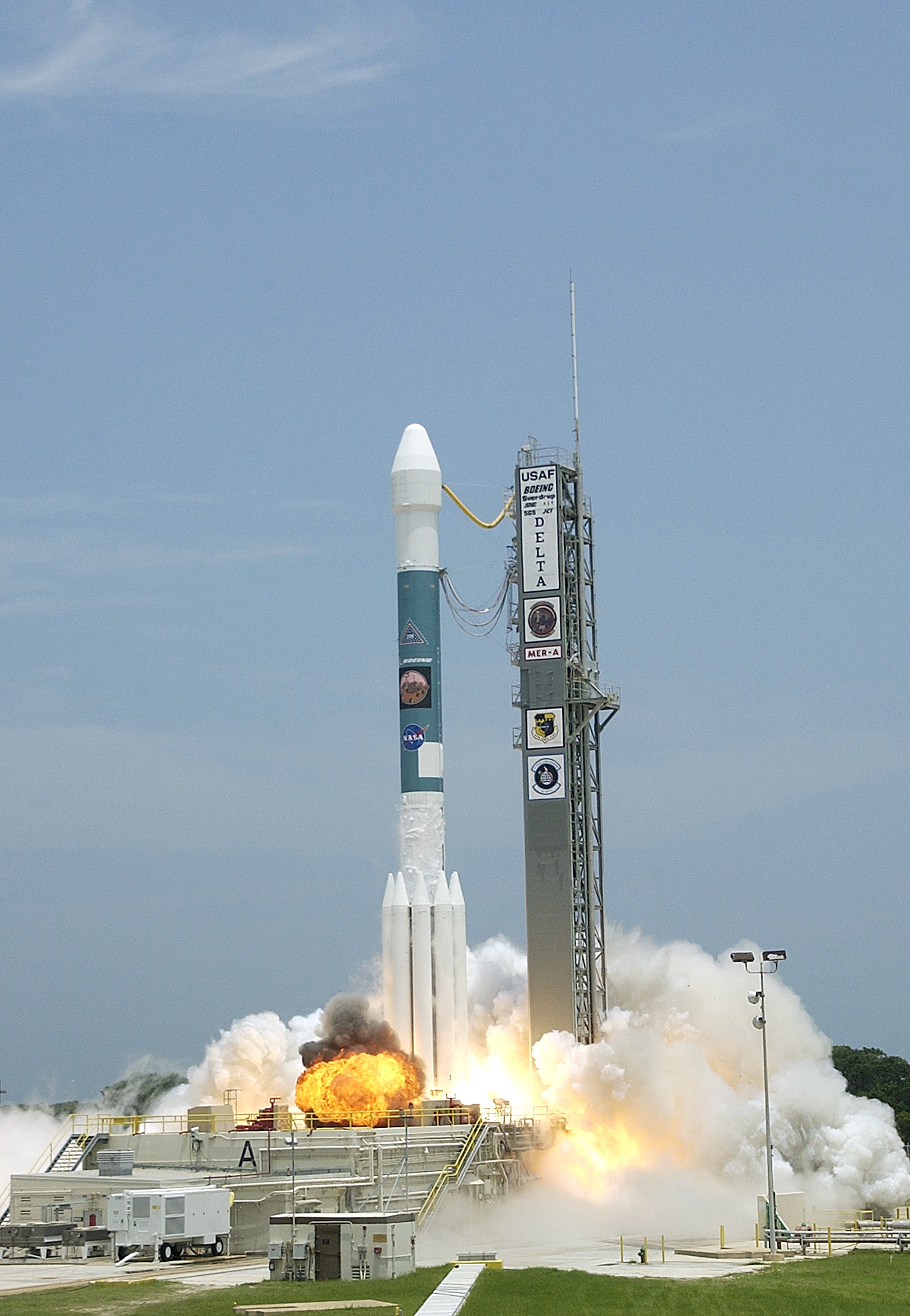 KENNEDY SPACE CENTER, FLA. - The Delta II rocket with its Mars Exploration Rover (MER-A) payload leaps off the launch pad into the blue sky to begin its journey to Mars. Liftoff occurred on time at 1:58 p.m. EDT from Launch Complex 17-A, Cape Canaveral Air Force Station. MER-A, known as "Spirit," is the first of two rovers being launched to Mars. When the two rovers arrive at the red planet in 2004, they will bounce to airbag-cushioned landings at sites offering a balance of favorable conditions for safe landings and interesting science. The rovers see sharper images, can explore farther and examine rocks better than anything that has ever landed on Mars. The designated site for the MER-A mission is Gusev Crater, which appears to have been a crater lake. The second rover, MER-B, is scheduled to launch June 25.