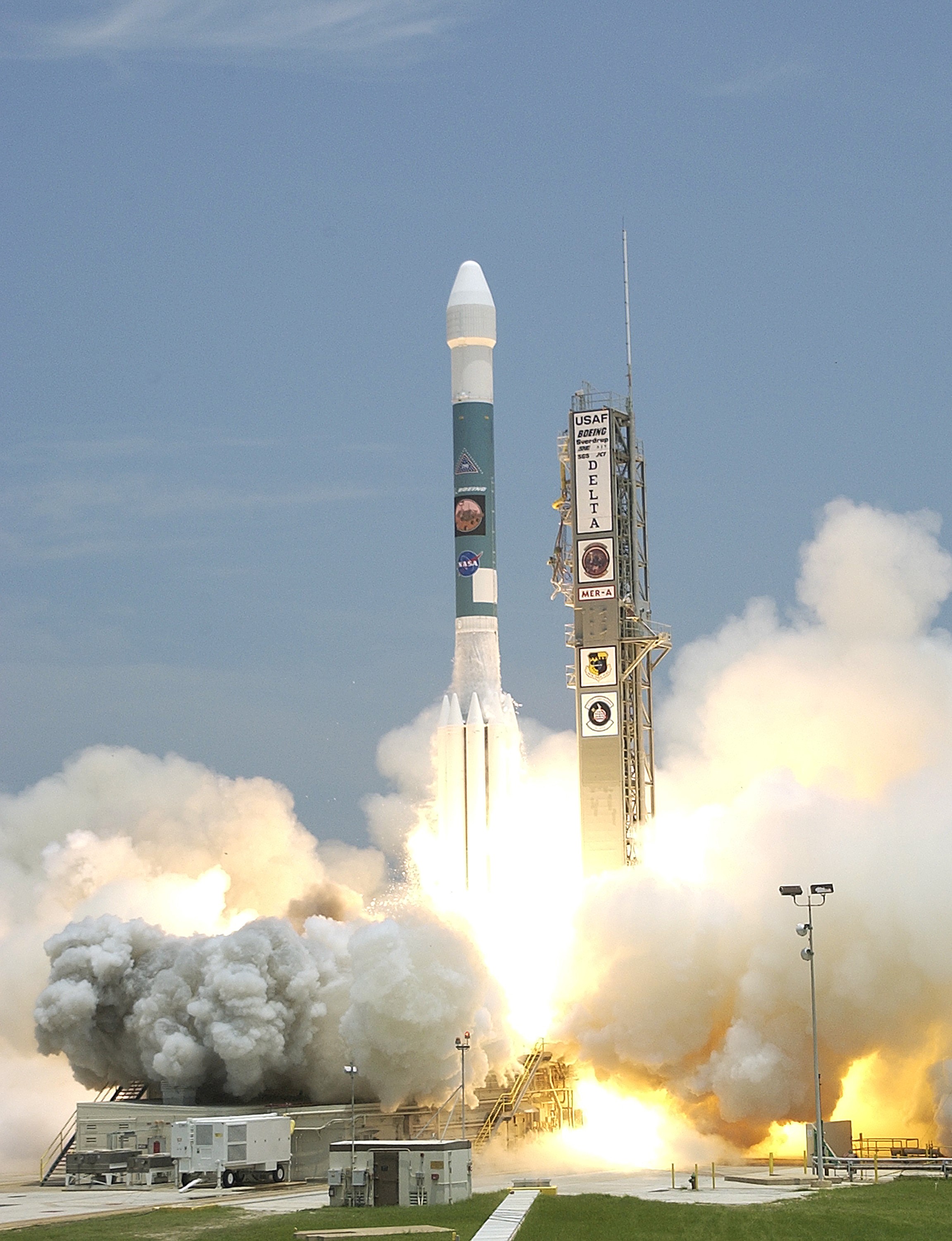 KENNEDY SPACE CENTER, FLA. - The Delta II rocket with its Mars Exploration Rover (MER-A) payload leaps off the launch pad into the blue sky to begin its journey to Mars. Liftoff occurred on time at 1:58 p.m. EDT from Launch Complex 17-A, Cape Canaveral Air Force Station. MER-A, known as "Spirit," is the first of two rovers being launched to Mars. When the two rovers arrive at the red planet in 2004, they will bounce to airbag-cushioned landings at sites offering a balance of favorable conditions for safe landings and interesting science. The rovers see sharper images, can explore farther and examine rocks better than anything that has ever landed on Mars. The designated site for the MER-A mission is Gusev Crater, which appears to have been a crater lake. The second rover, MER-B, is scheduled to launch June 25.
