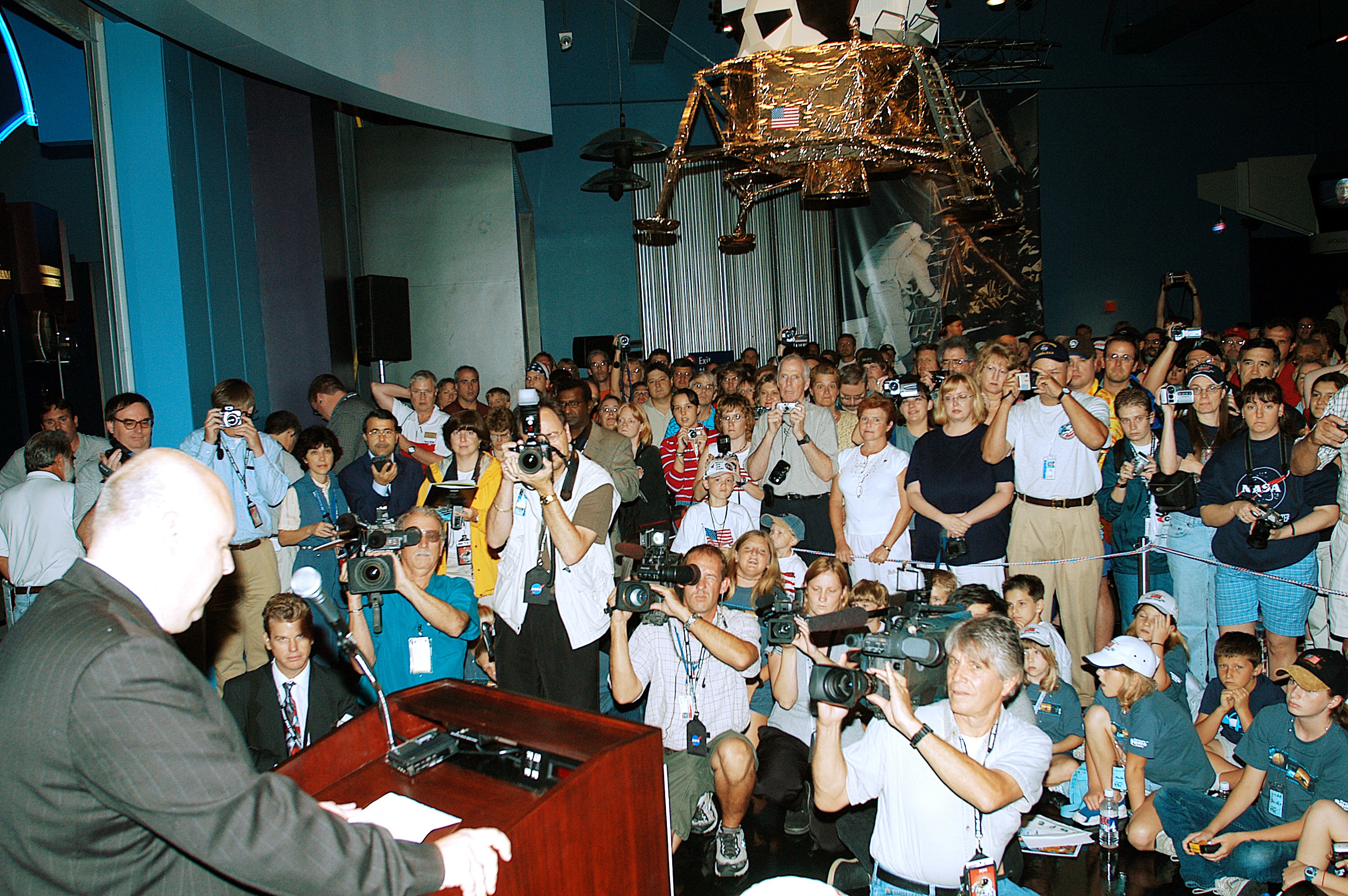 KENNEDY SPACE CENTER, FLA. - Daniel LeBlanc, chief operating officer of Delaware North Companies Parks and Resorts at KSC, makes the opening remarks to hundreds of guests and media representatives attending a ribbon cutting ceremony officially opening the U.S. Astronaut Hall of Fame as part of the Kennedy Space Center Visitor Complex. The ceremony was held in conjunction with the induction of four Space Shuttle astronauts into the Hall of Fame including Daniel Brandenstein, Robert "Hoot" Gibson, Story Musgrave, and Sally Ride. Conceived by six of the Mercury Program astronauts, the U.S. Astronaut Hall of Fame opened in 1990 to provide a place where space travelers could be remembered for their participation and accomplishments in the U.S. space program. The four new inductees join 48 previously honored astronauts from the ranks of the Gemini, Apollo, Skylab, Apollo-Soyuz, and Space Shuttle programs.
