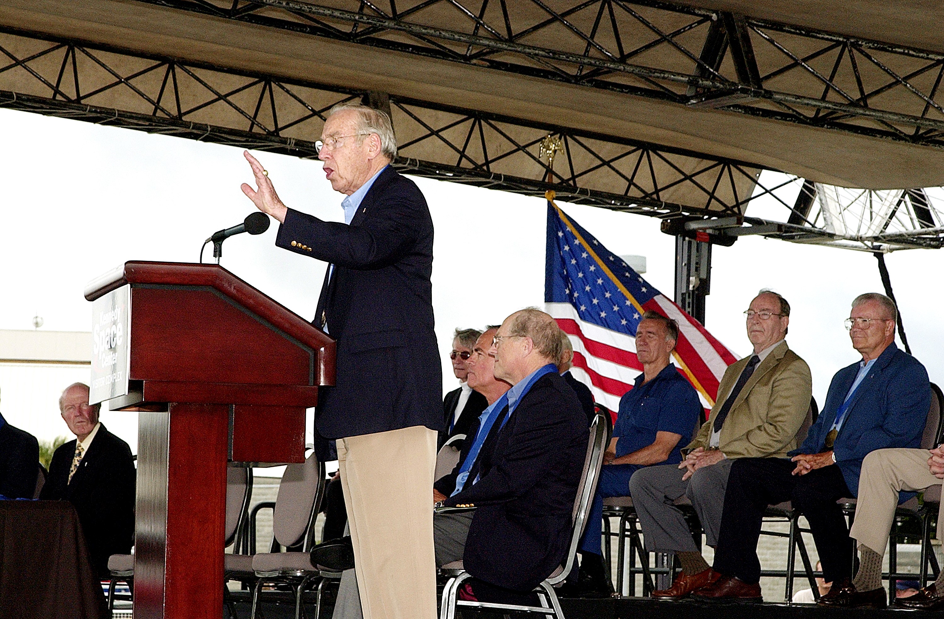 KENNEDY SPACE CENTER, FLA. - At the KSC Visitor Complex, former astronaut James Lovell makes the opening remarks at the induction ceremony of four Space Shuttle astronauts into the U.S. Astronaut Hall of Fame. Being inducted are Daniel Brandenstein, Robert "Hoot" Gibson, Story Musgrave, and Sally Ride. Conceived by six of the Mercury Program astronauts, the U.S. Astronaut Hall of Fame opened in 1990 to provide a place where space travelers could be remembered for their participation and accomplishments in the U.S. space program. The four new inductees join 48 previously honored astronauts from the ranks of the Gemini, Apollo, Skylab, Apollo-Soyuz, and Space Shuttle programs.