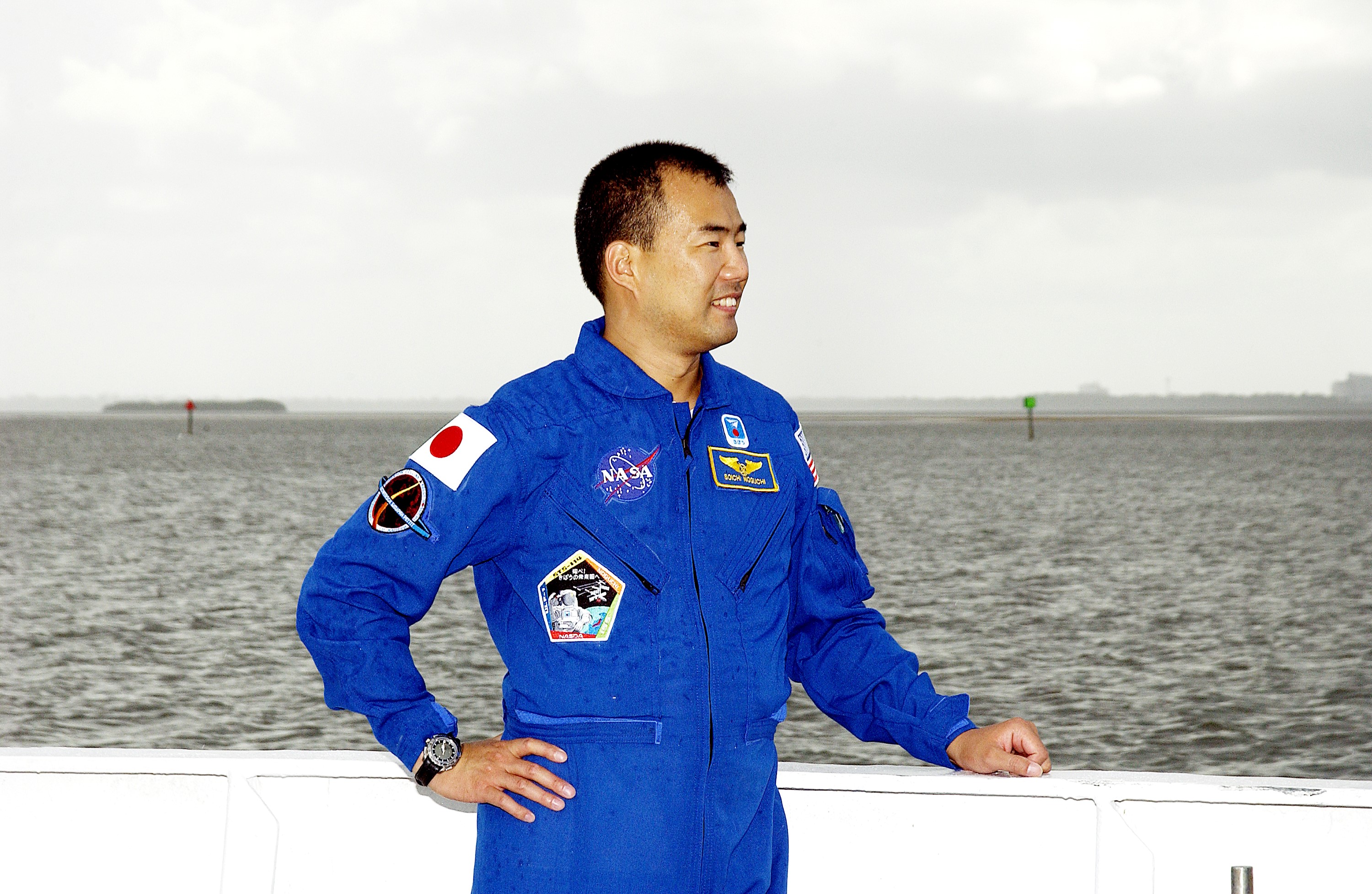 KENNEDY SPACE CENTER, FLA. - STS-114 Mission Specialist Soichi Noguchi, who is with the Japanese space agency NASDA, poses on the deck of one of the SRB Retrieval Ships docked at Hangar AF on the Banana River. He and other crew members Commander Eileen Collins, Pilot James Kelly and Mission Specialist Stephen Robinson toured the ships. Mission STS-114 will carry the MultiPurpose Logistics Module (MPLM) Raffaello and External Stowage Platform 2 to the International Space Station. The MPLM will contain supplies and equipment. Another goal of the mission is to remove and replace a Control Moment Gyro. Launch date for mission STS-114 is under review.