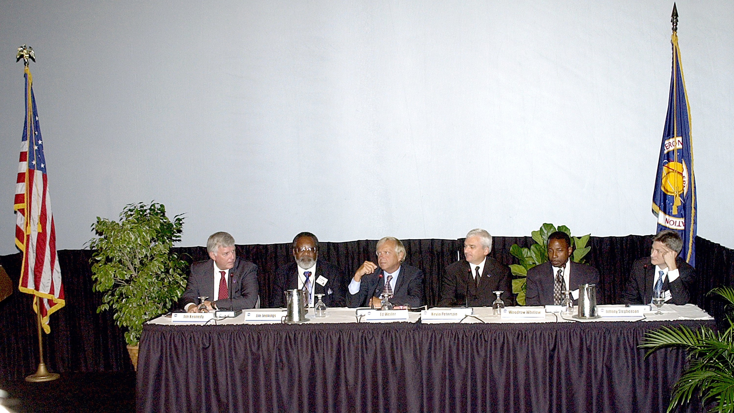 KENNEDY SPACE CENTER, FLA. - NASA leaders discuss the Agency’s One NASA initiative with selected employees at the KSC Visitor Complex IMAX Theater®. From left are KSC Director Jim Kennedy; James Jennings, NASA’s associate deputy administrator for institutions and asset management; Ed Weiler, associate administrator for Space Science; Kevin Peterson, Dryden Flight Research Center director; incoming KSC Deputy Director Woodrow Whitlow; and implementation team lead Johnny Stevenson. Glenn Research Center Director Dr. Julian Earls gave a motivational speech during the luncheon held at the Visitor Complex Debus Conference Center.