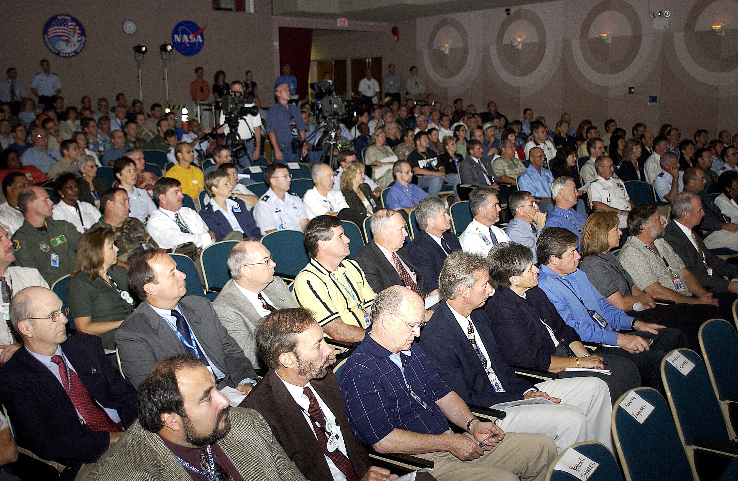 KENNEDY SPACE CENTER, FLA. - Employees fill the Training Auditorium for the kickoff presentation for Spaceport Super Safety and Health Day. Along with Center Director Jim Kennedy, guest speakers were Brig. Gen. J. Gregory Pavlovich, 45th Space Wing, Maj. Gen. Kevin Chilton, and Capt. Charles Plumb (USNR retired), who spoke about his experiences in the Navy and as a prisoner of war in Vietnam. Spaceport Super Safety and Health Day is an annual event at KSC and Cape Canaveral Air Force Station dedicated to reinforcing safe and healthful behaviors in the workforce. Safety Awards were also given to individuals and groups.