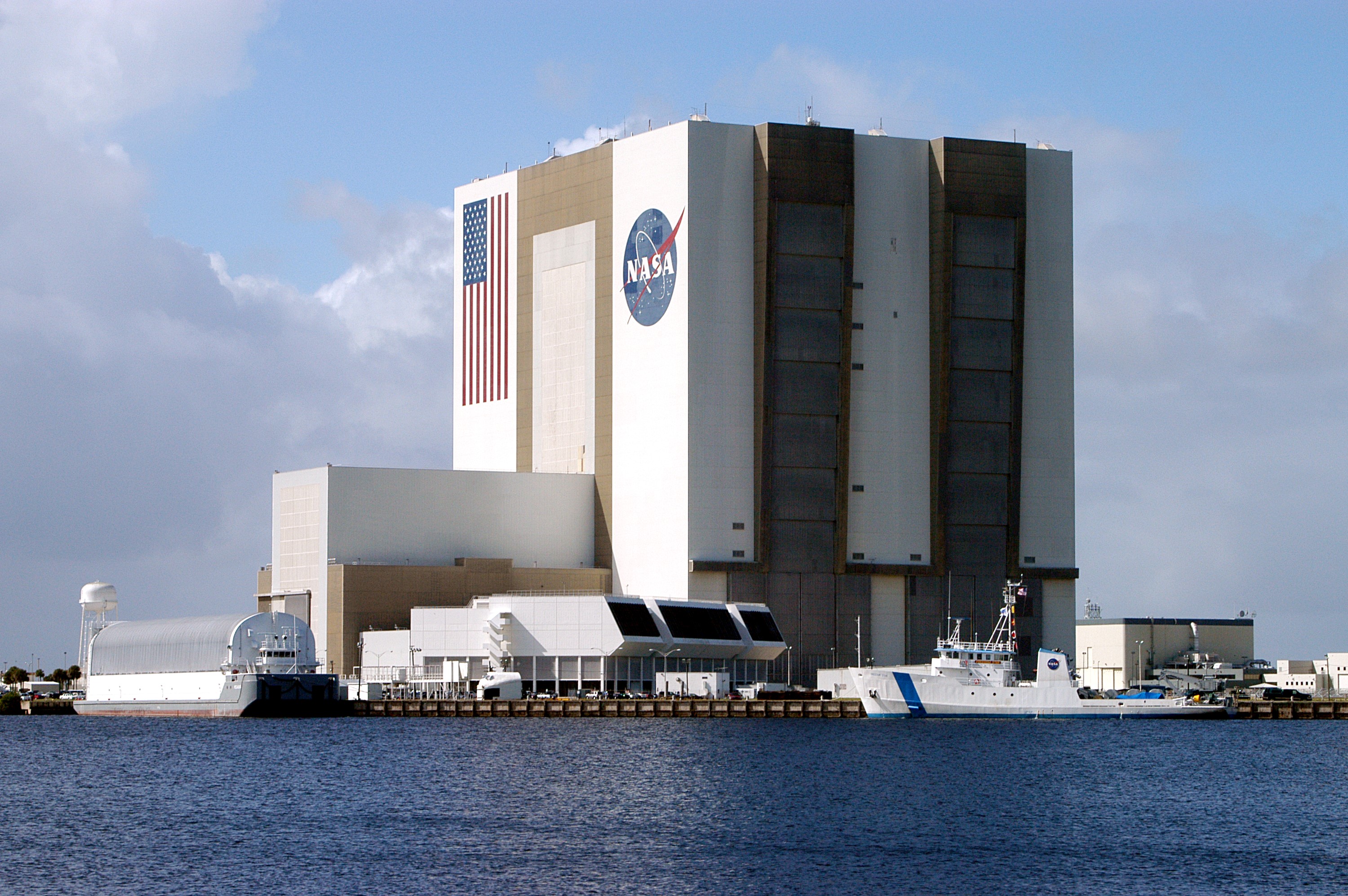 KENNEDY SPACE CENTER, FLA. - The Freedom Star is berthed at the Turn Basin near the Vehicle Assembly Building. The ship has recently returned to KSC after refurbishment at Fort George Island, Fla., including new paint. Freedom Star is one of the solid rocket booster (SRB) retrieval ships built to recover the SRB casings released over the Atlantic Ocean after launch of a Space Shuttle. In addition to the SRBs, the ship recovers the drogue and main parachutes that slow the boosters’ speed before splashdown. Some of the retrieval equipment can be seen on the rear deck. The ships also tow the external tanks built at the Michoud Space Systems Assembly Facility near New Orleans to Port Canaveral, Fla. Freedom Star was brought to KSC today for a visit by NATO Parliamentarians.