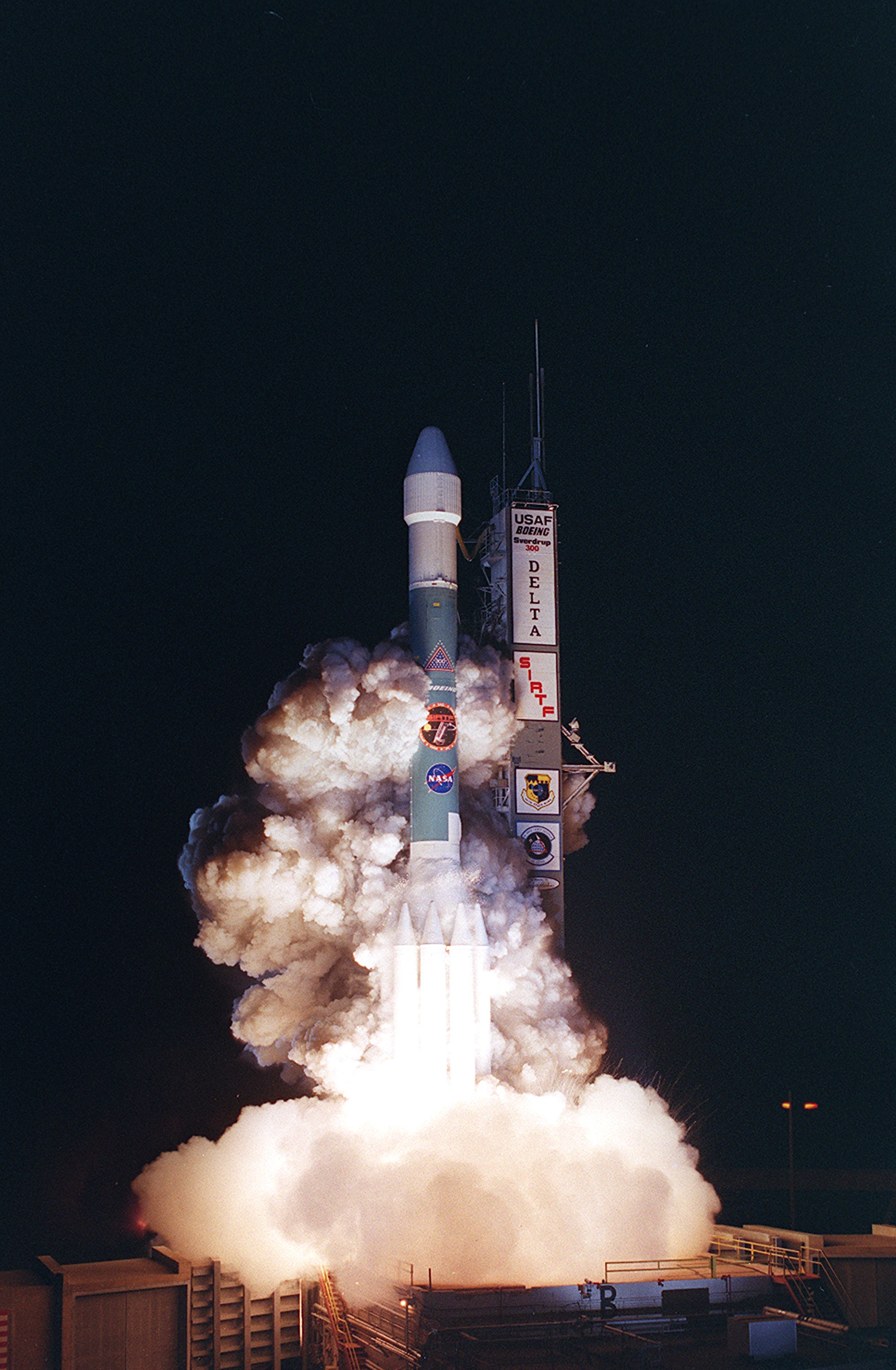 KENNEDY SPACE CENTER, FLA. - NASA's Space Infrared Telescope Facility (SIRTF) lifts off from Launch Pad 17-B, Cape Canaveral Air Force Station, on Aug. 25 at 1:35:39 a.m. EDT. SIRTF will obtain images and spectra by detecting the infrared energy, or heat, radiated by objects in space. Consisting of a 0.85-meter telescope and three cryogenically cooled science instruments, SIRTF will be the largest infrared telescope ever launched into space. It is the fourth and final element in NASA’s family of orbiting “Great Observatories.” Its highly sensitive instruments will give a unique view of the Universe and peer into regions of space that are hidden from optical telescopes.