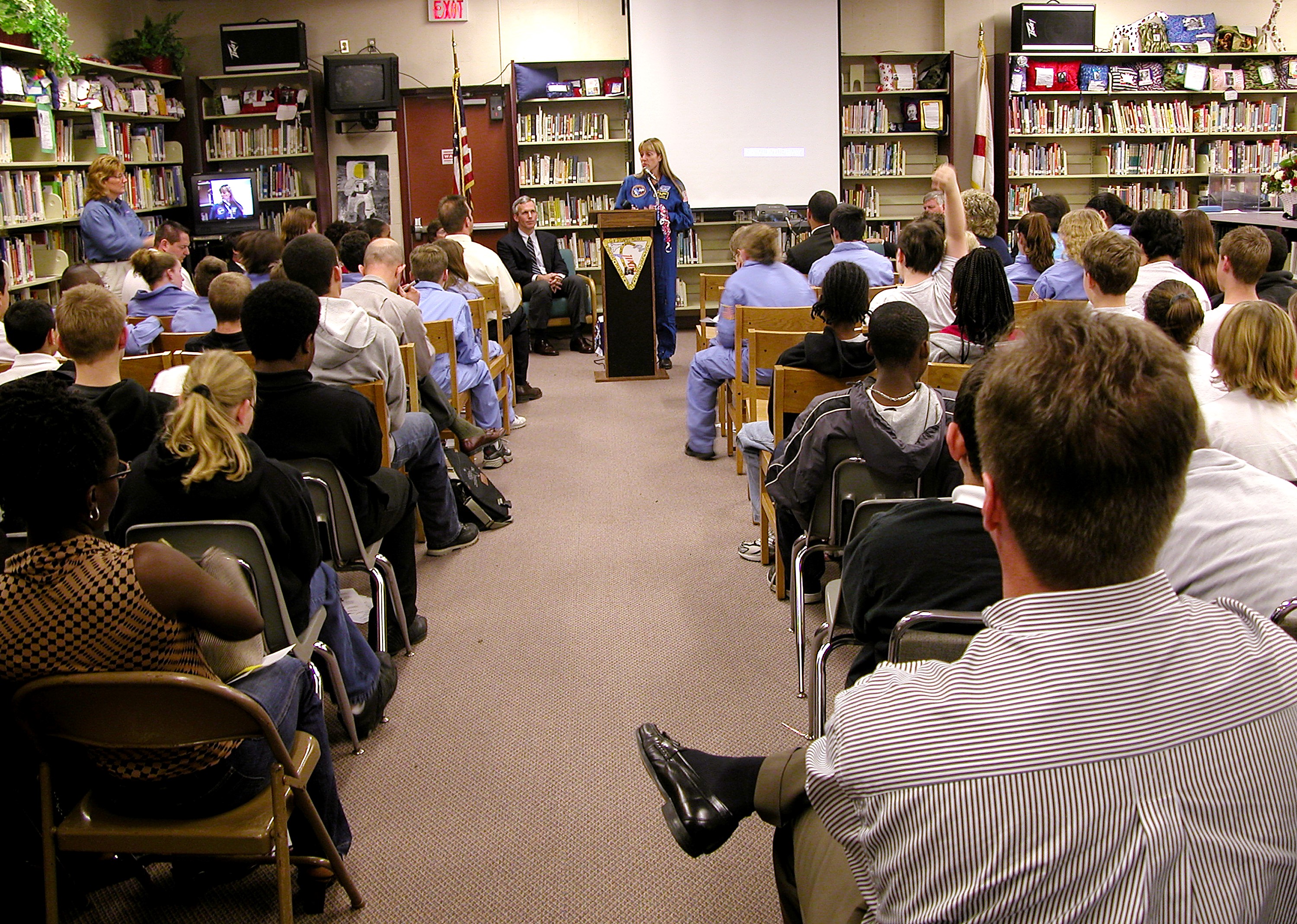 KENNEDY SPACE CENTER, FLA. - Astronaut Kay Hire talks to students in Garland V. Stewart Magnet Middle School, a NASA Explorer School (NES) in Tampa, Fla. She joined Center Director Jim Kennedy in sharing the agency’s new vision for space exploration with the next generation of explorers. Kennedy is talking with students about our destiny as explorers, NASA’s stepping stone approach to exploring Earth, the Moon, Mars and beyond, how space impacts our lives, and how people and machines rely on each other in space.