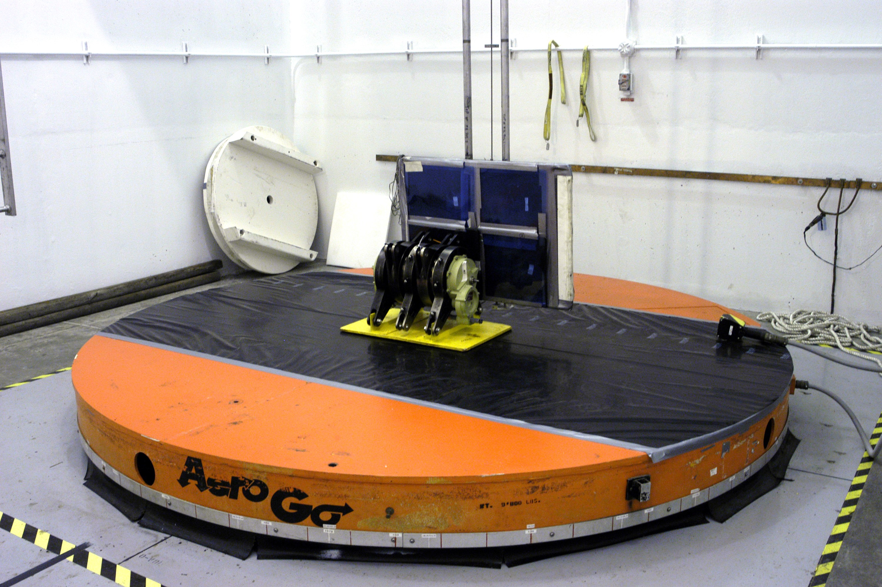 KENNEDY SPACE CENTER, FLA. - A rudder speed brake actuator sits on an air-bearing pallet to undergo X-raying. Four actuators to be installed on the orbiter Discovery are being X-rayed at the Radiographic High-Energy X-ray Facility to determine if the gears were installed correctly. Discovery has been assigned to the first Return to Flight mission, STS-114, a logistics flight to the International Space Station.