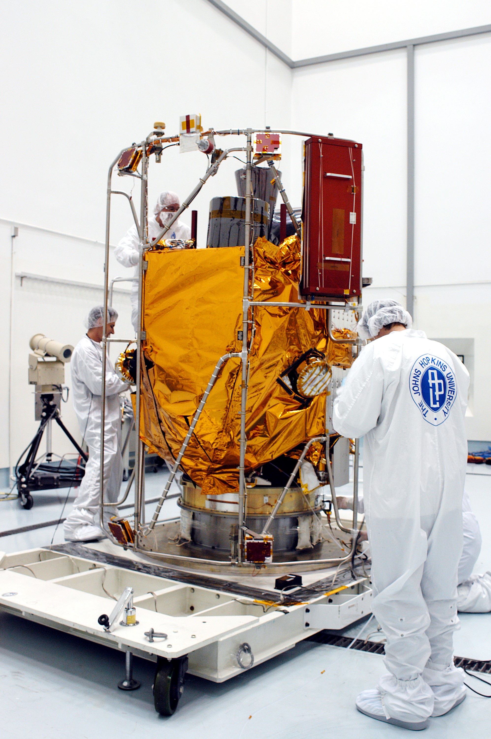 KENNEDY SPACE CENTER, FLA. - In the high bay clean room at the Astrotech Space Operations processing facilities near KSC, NASA’s MESSENGER spacecraft is revealed. Employees of the Johns Hopkins University Applied Physics Laboratory, builders of the spacecraft, will perform an initial state-of-health check. Then processing for launch can begin, including checkout of the power systems, communications systems and control systems. The thermal blankets will also be attached for flight. MESSENGER - short for MErcury Surface, Space ENvironment, GEochemistry and Ranging - will be launched May 11 on a six-year mission aboard a Boeing Delta II rocket. Liftoff is targeted for 2:26 a.m. EDT on Tuesday, May 11.