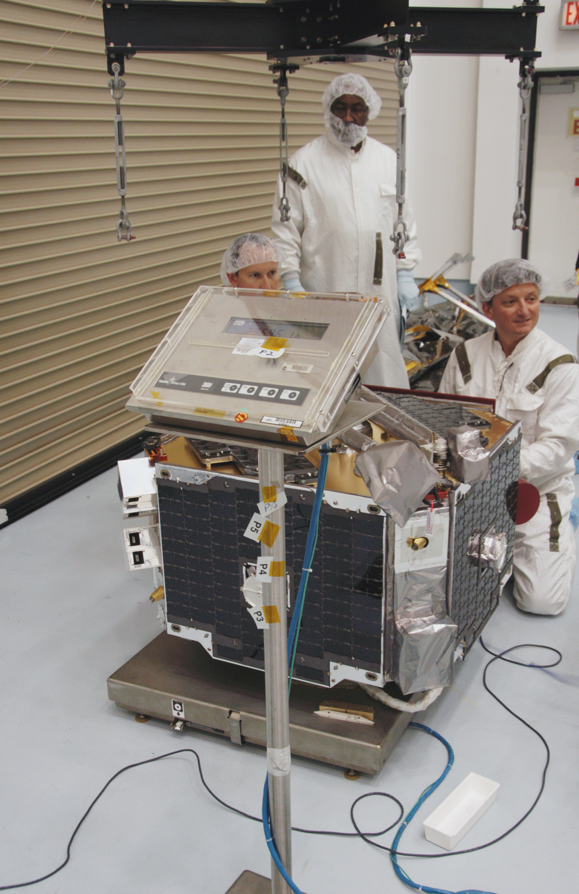 Inspection work on THEMIS at Astrotech