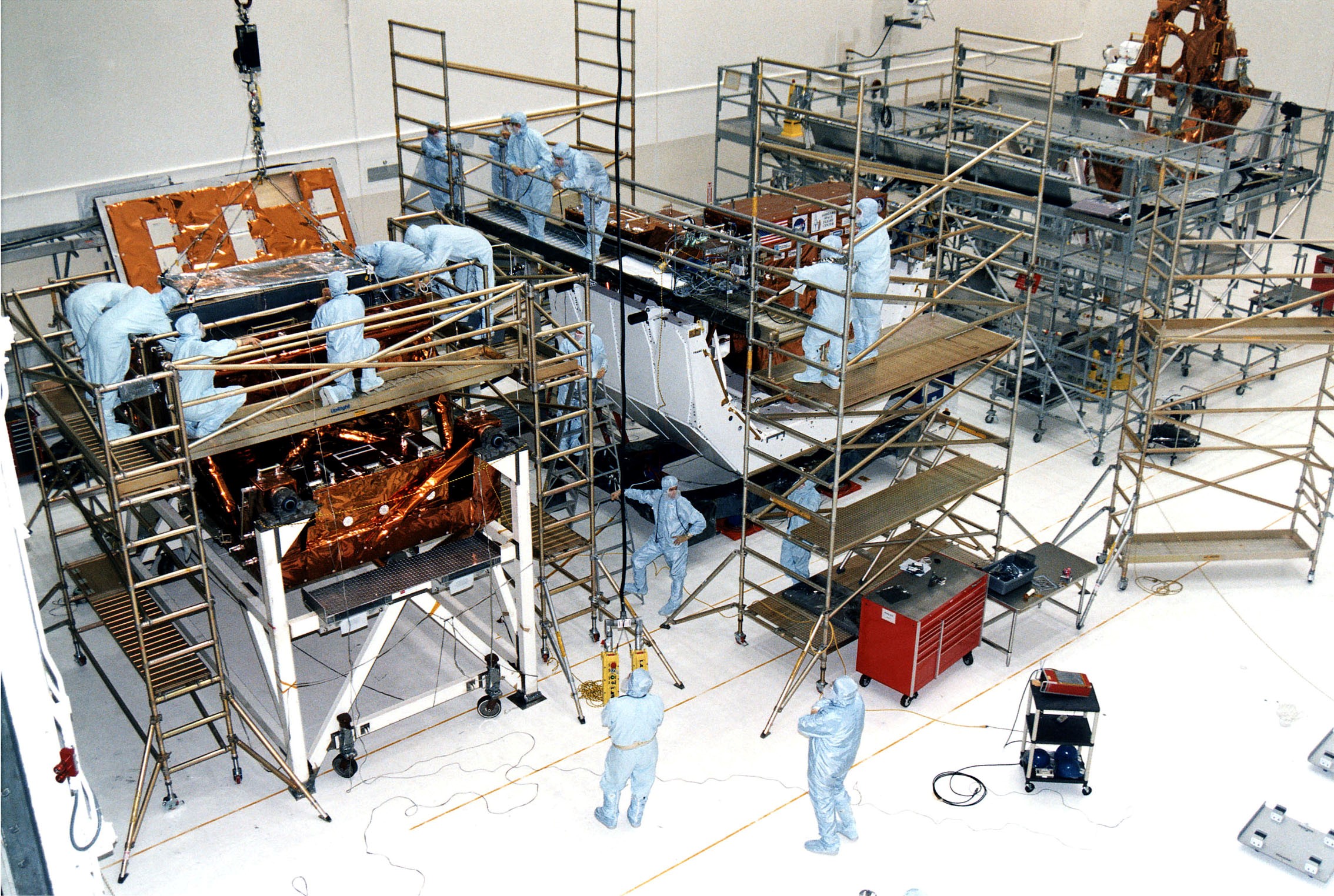 KENNEDY SPACE CENTER, FLA. - Workers in KSC's Vertical Processing Facility make final prelaunch prepartions to various payload elements that are part of the second Hubble Space Telescope (HST) servicing mission, STS-82. Liftoff is targeted Feb. 11 aboard Discovery with a crew of seven.