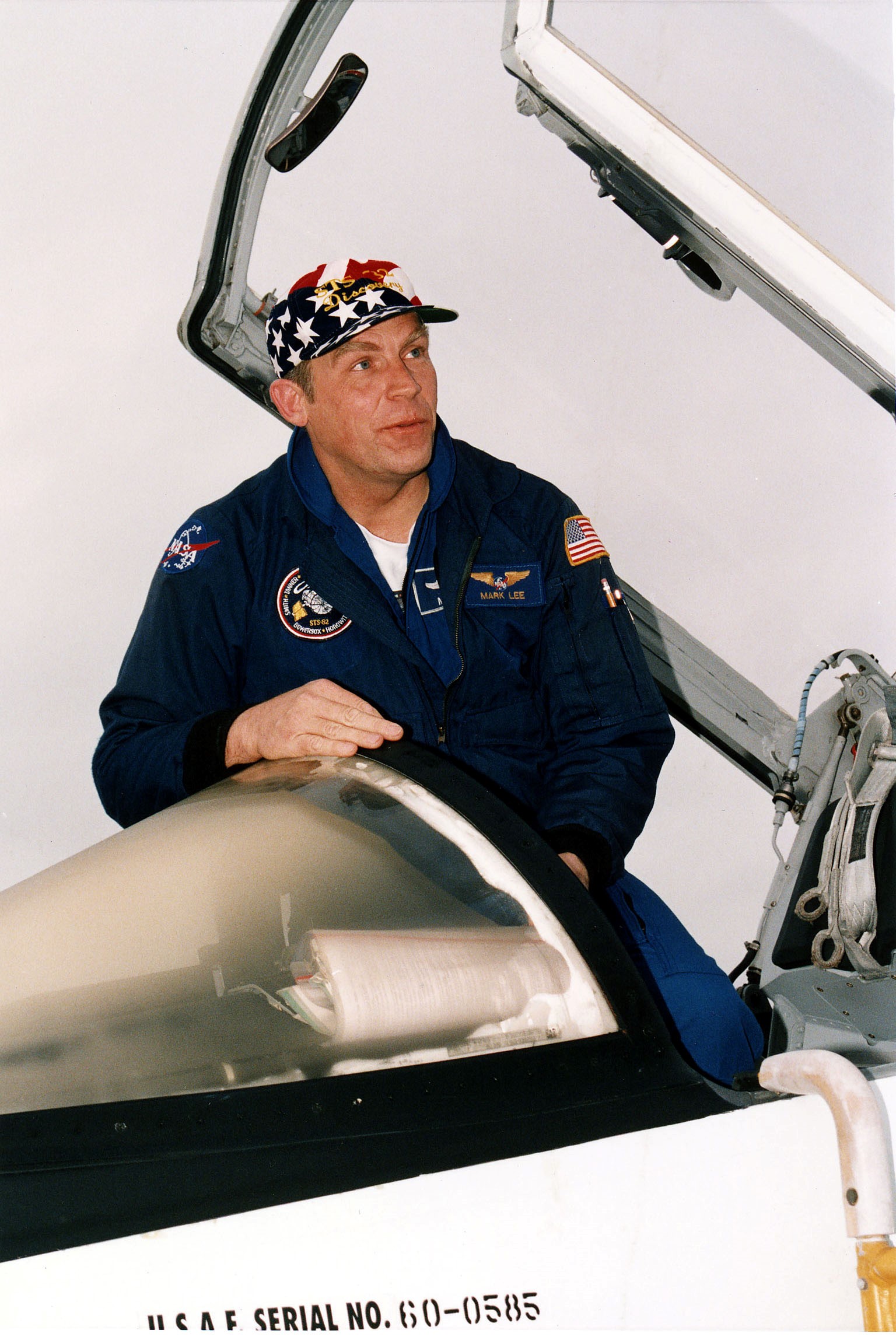 KENNEDY SPACE CENTER, FLA. - STS-82 Payload Commander Mark C. Lee prepares to step down from the T-38 jet he flew from an air field serving the astronauts' home base at Johnson Space Center, Houston, Texas, to KSC's Shuttle Landing Facility. Lee and the other six members of the STS-82 crew will spend the last few days before launch at KSC. STS-82 is scheduled for liftoff on Feb. 11 during a 65-minute launch window that opens at 3:56 a.m. EST. The 10-day flight aboard the Space Shuttle Discovery will be the second Hubble Space Telescope (HST) servicing mission.
