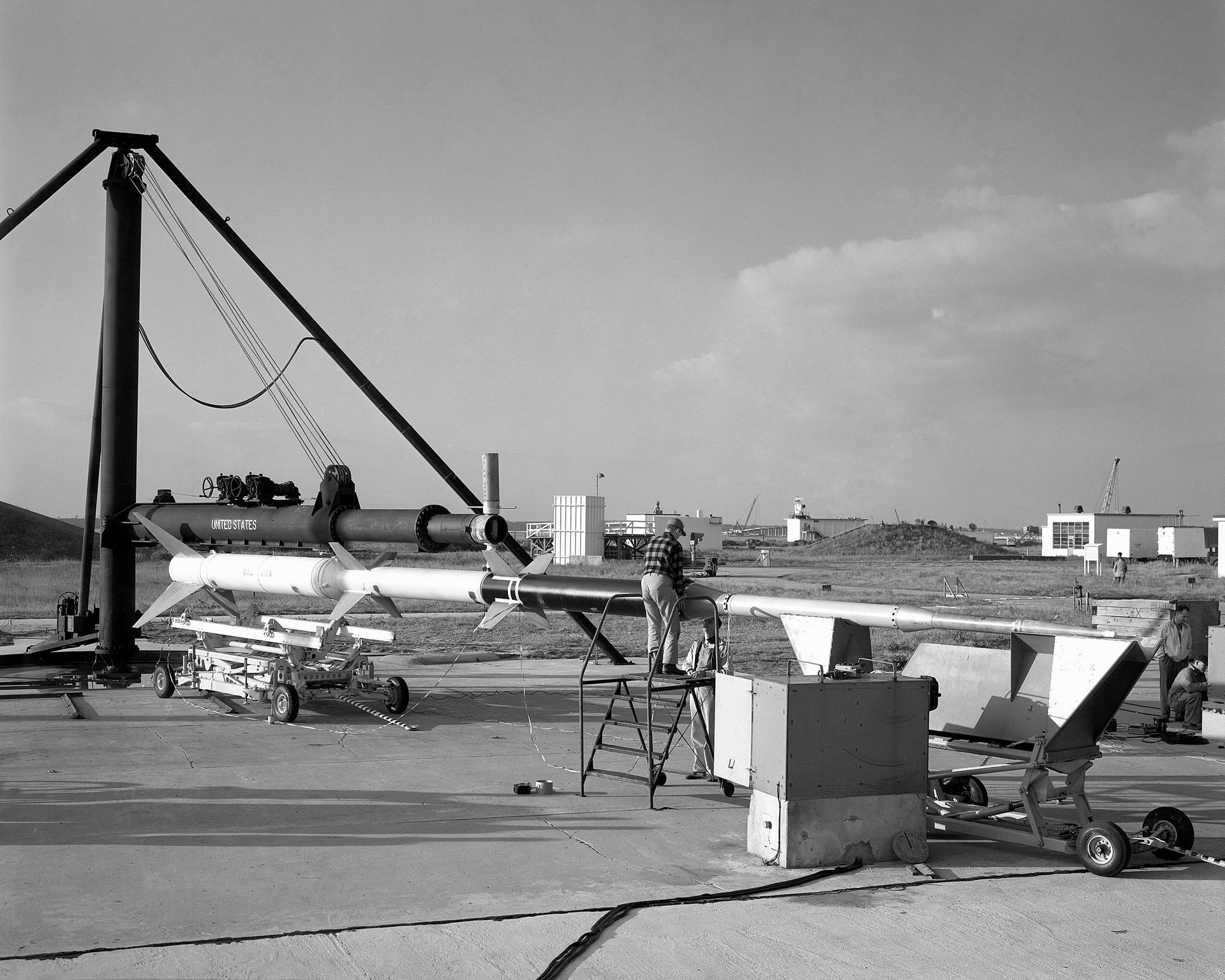 First University of Michigan Strongarm sounding rocket on launcher at Wallops for test, November 10, 1959E5-188 Shop and Launcher Pictures