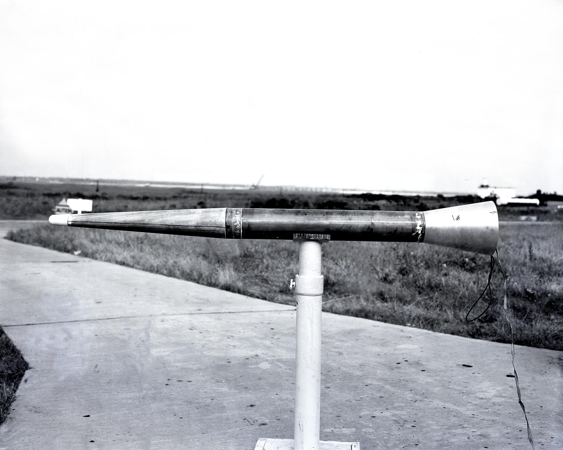 First University of Michigan Strongarm sounding rocket on launcher at Wallops for test, November 10, 1959E5-188 Shop and Launcher Pictures