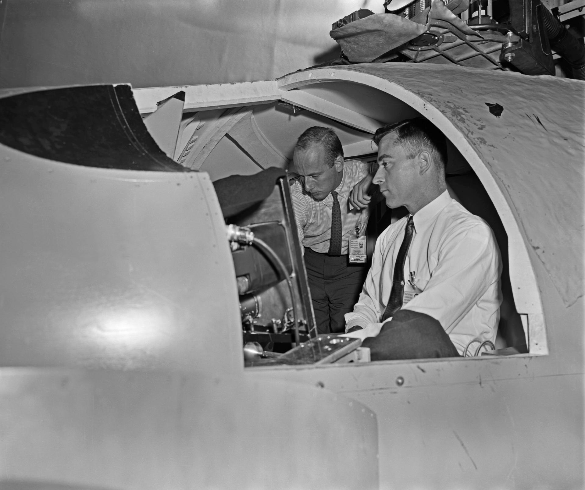 Charles P. Conrad, Jr. and John W. Young at Visual Docking Simulator