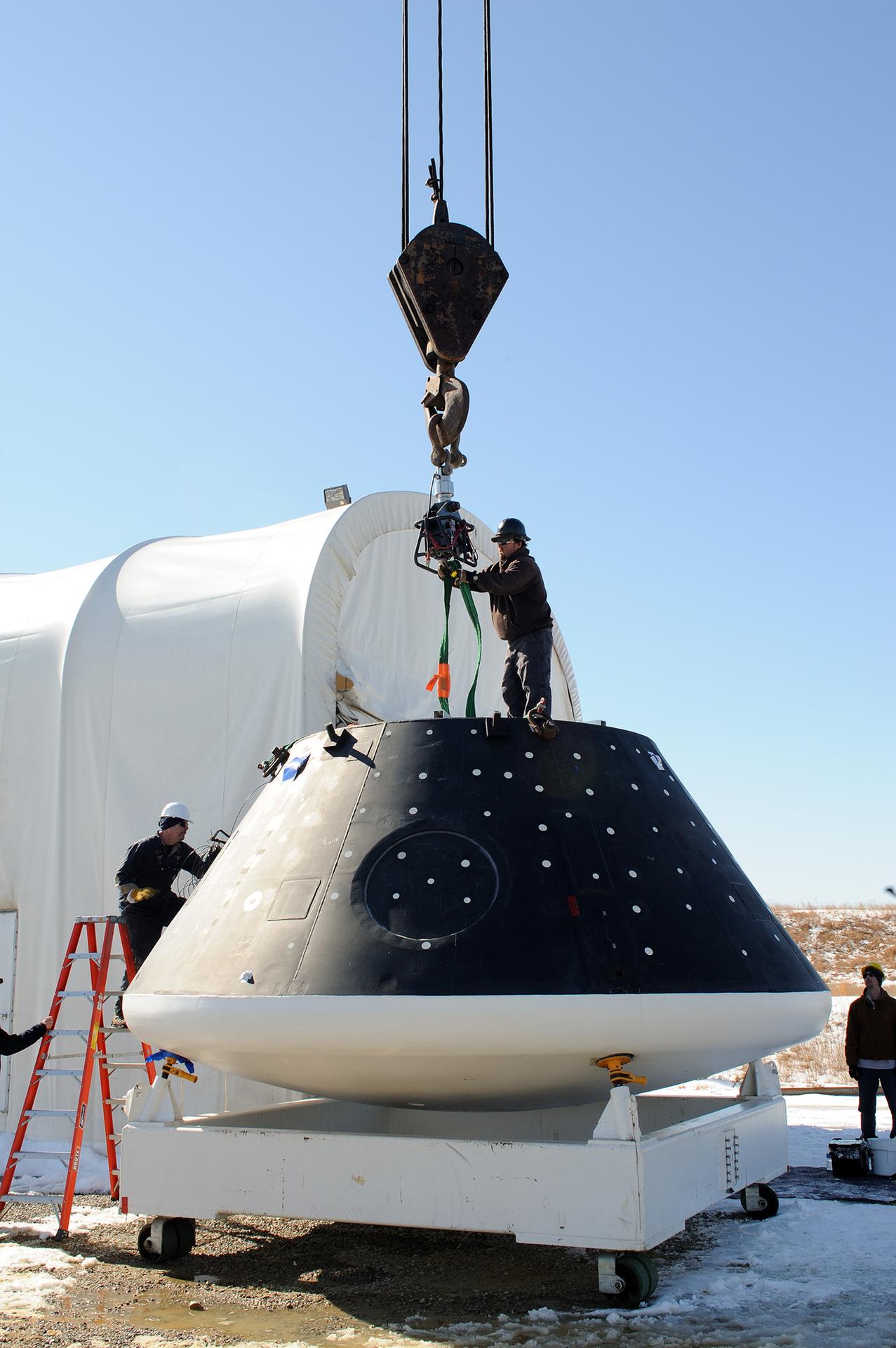 Crew Module Water Landing Model Assessment