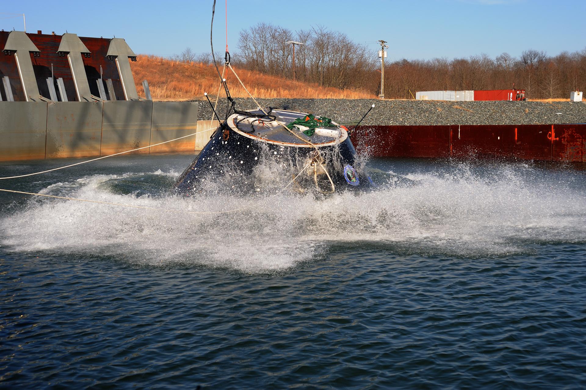 Crew Module Water Landing Model Assessment