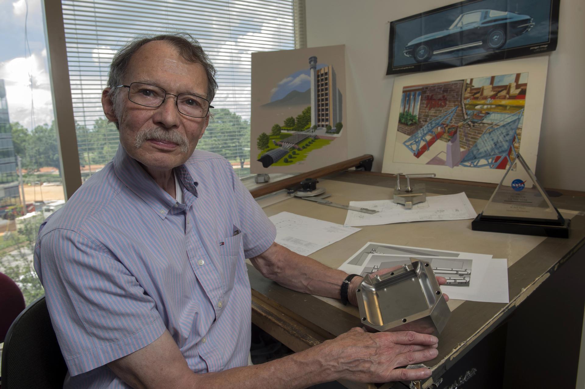 Inventor Neill Myers demonstrates his latest invention